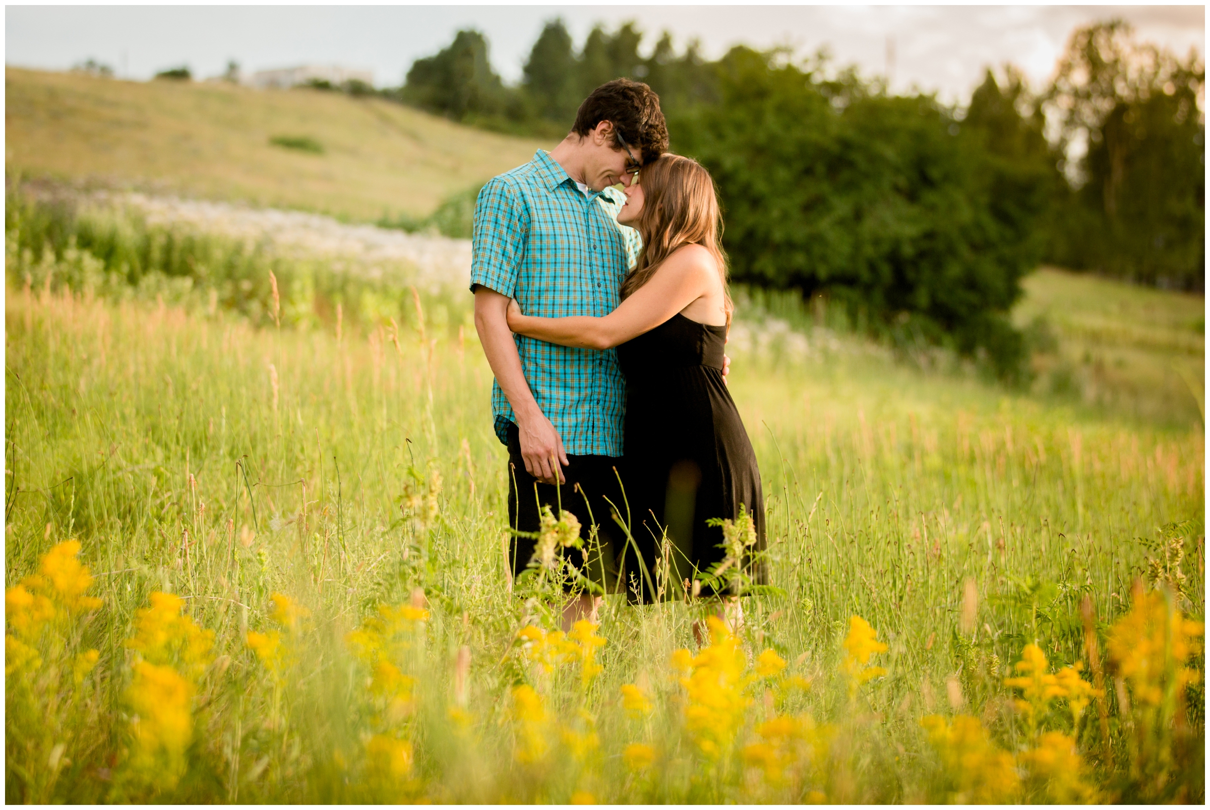 wildflower engagement pictures in Boulder Colorado by Plum Pretty Photo