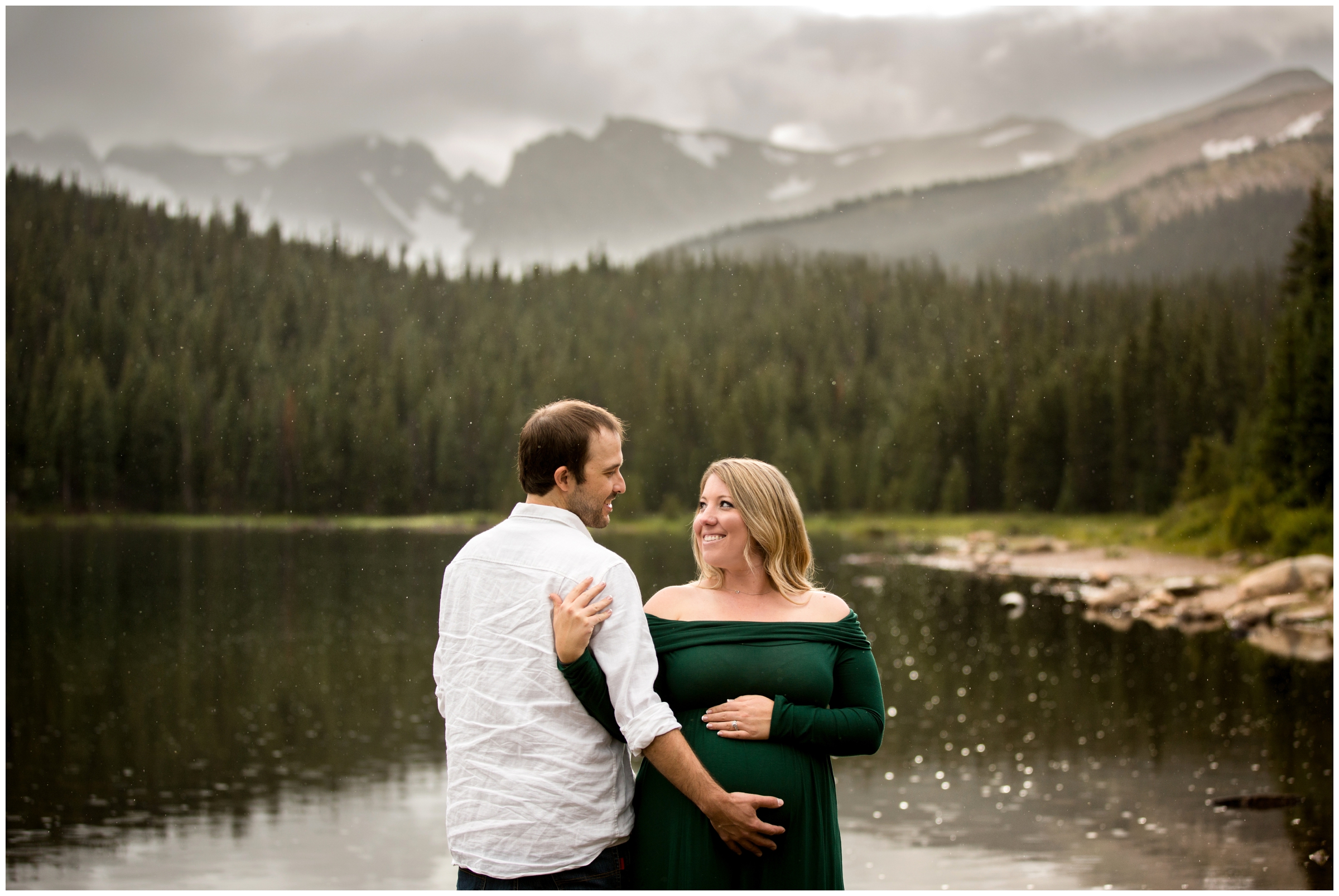 pregnancy photography session in front of a lake in CO