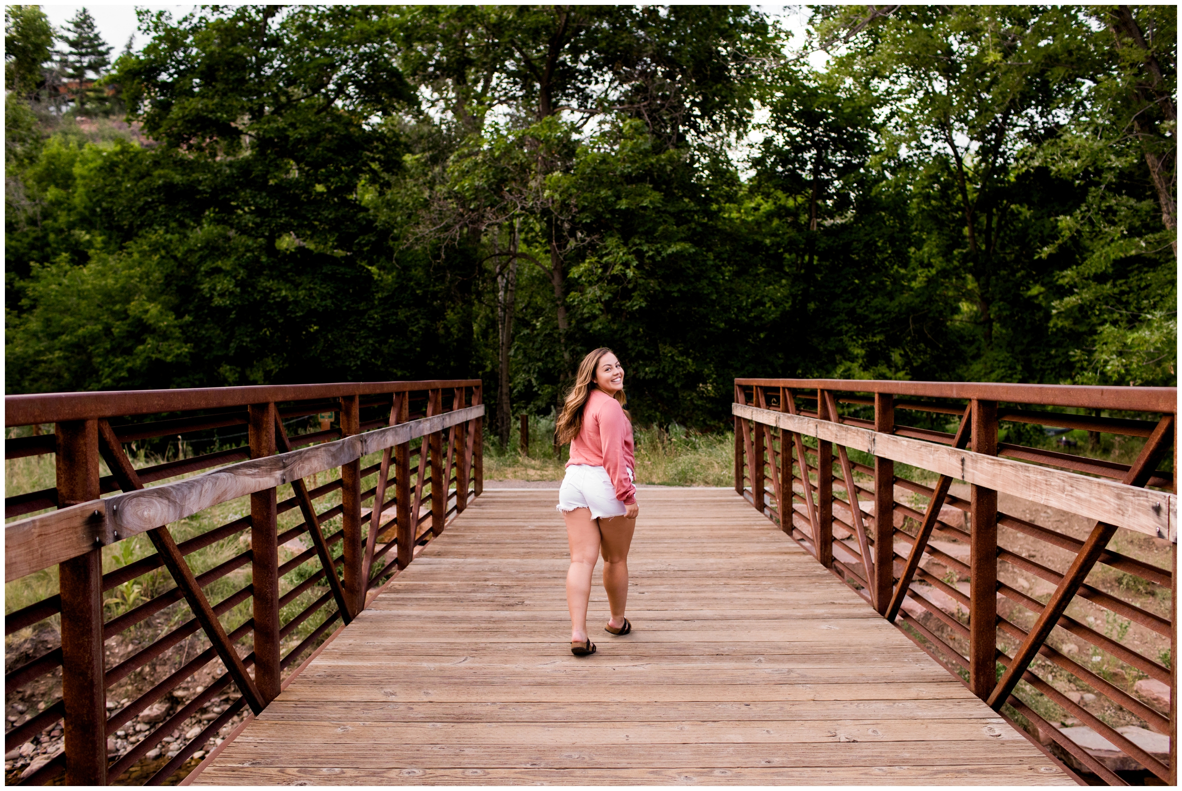 teen walking on bridge at Colorado portrait session 