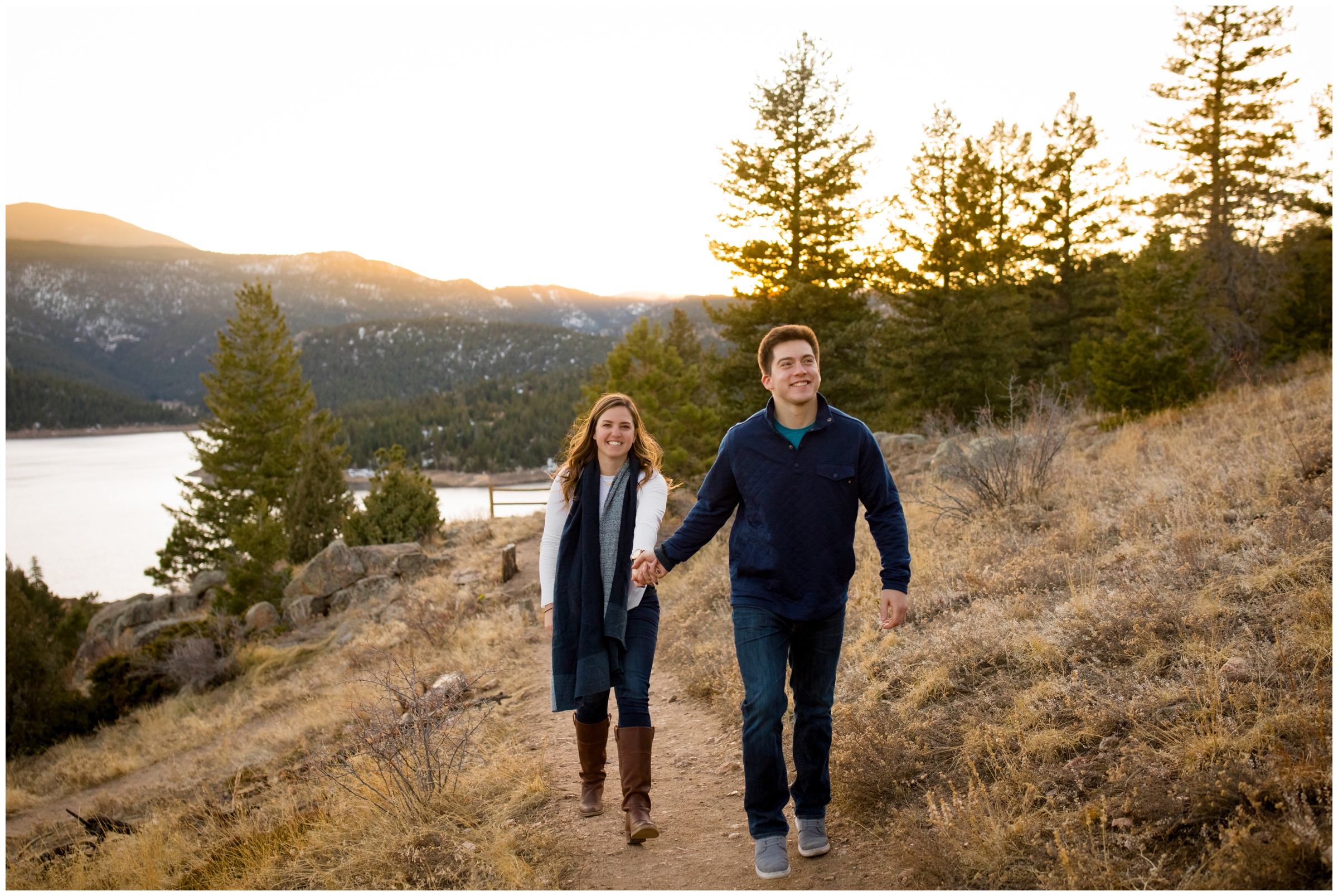 couple walking down trail at Gross Reservoir Boulder Colorado 