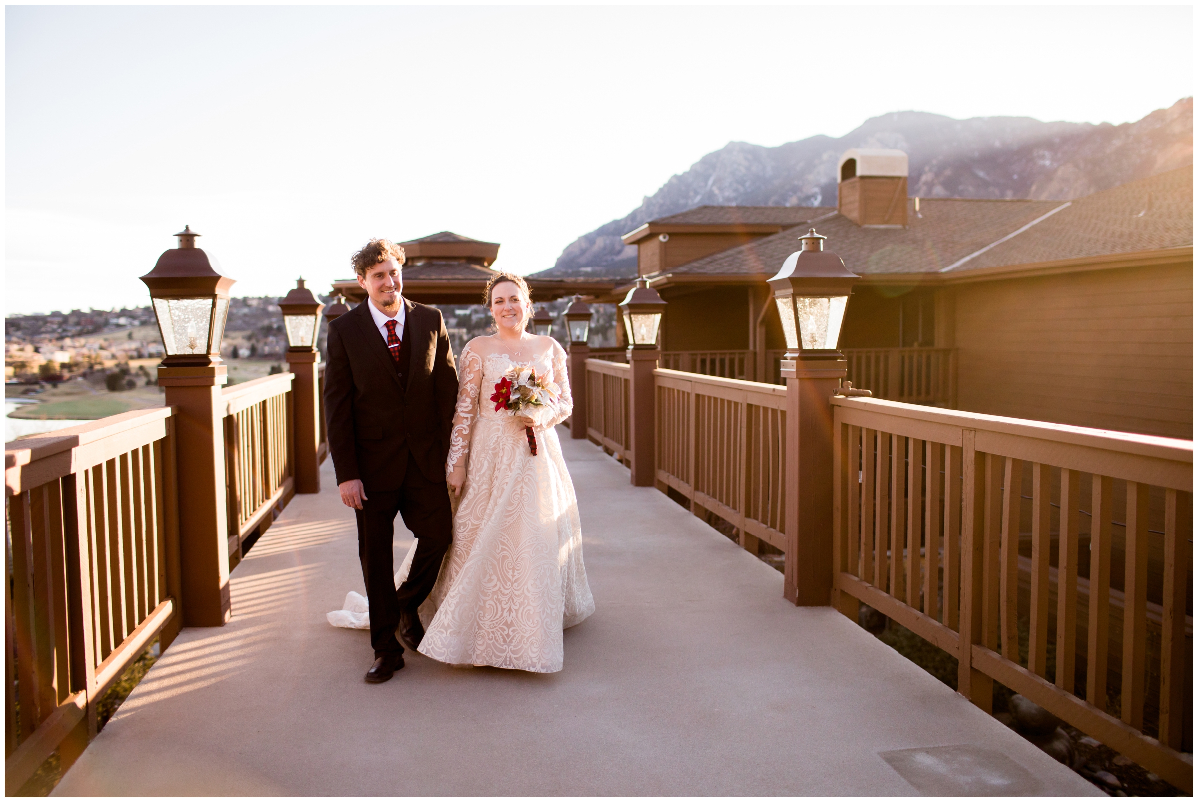 couple walking on balcony during Colorado springs wedding at Cheyenne Mountain Golf Club 