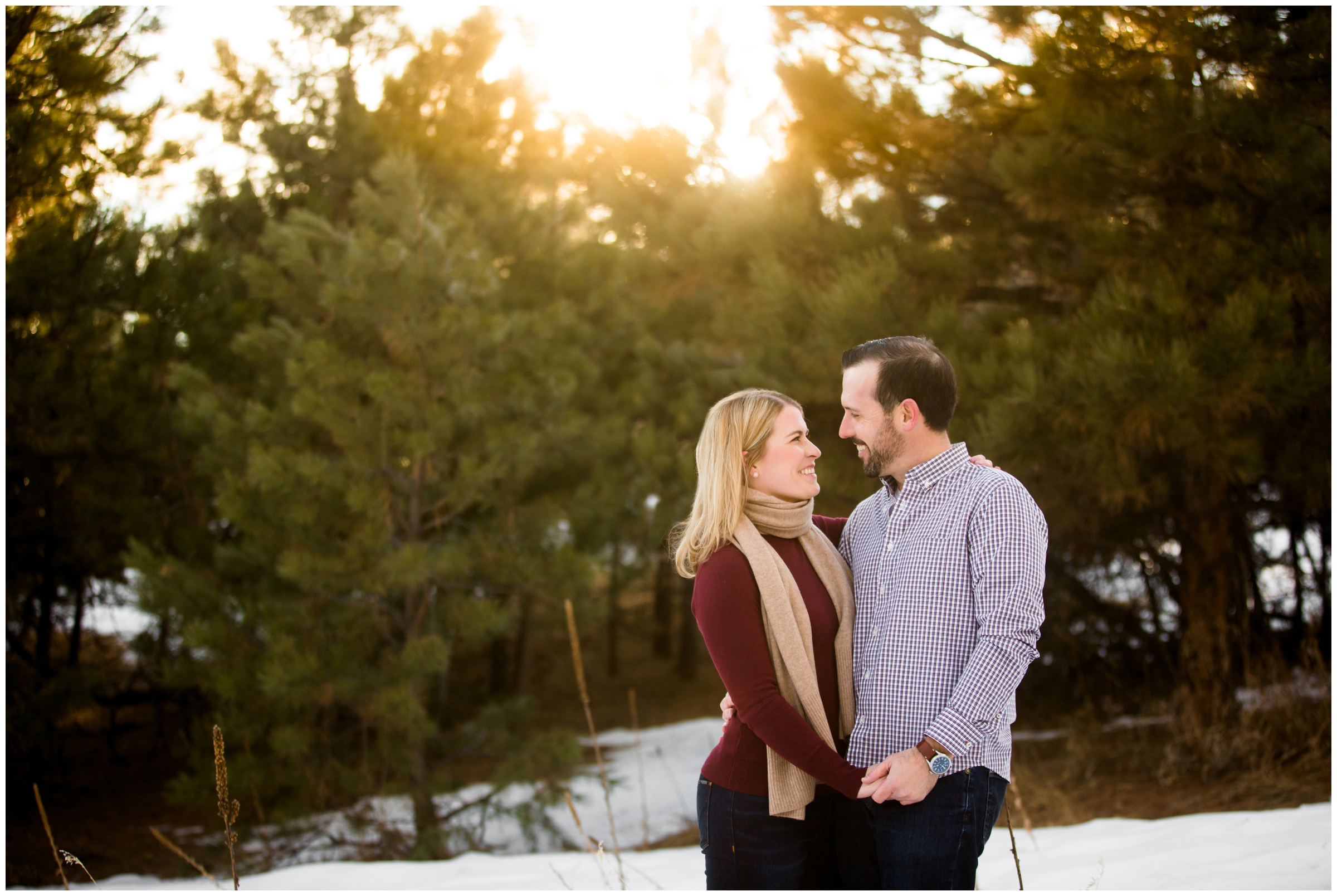 sunny and snowy engagement photos in Colorado forest 