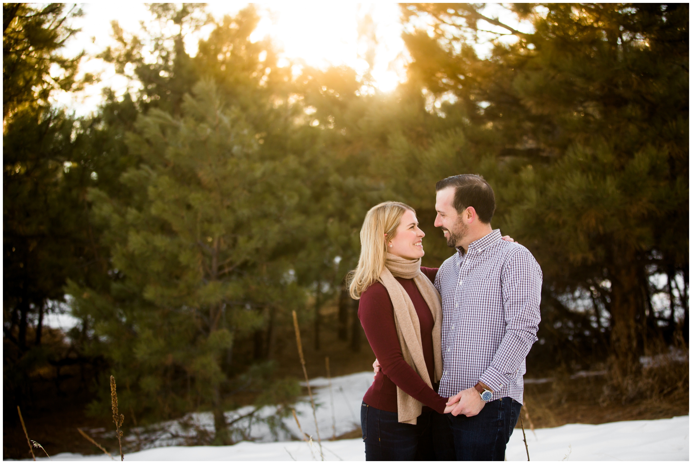 sunny and snowy engagement photos in Colorado forest
