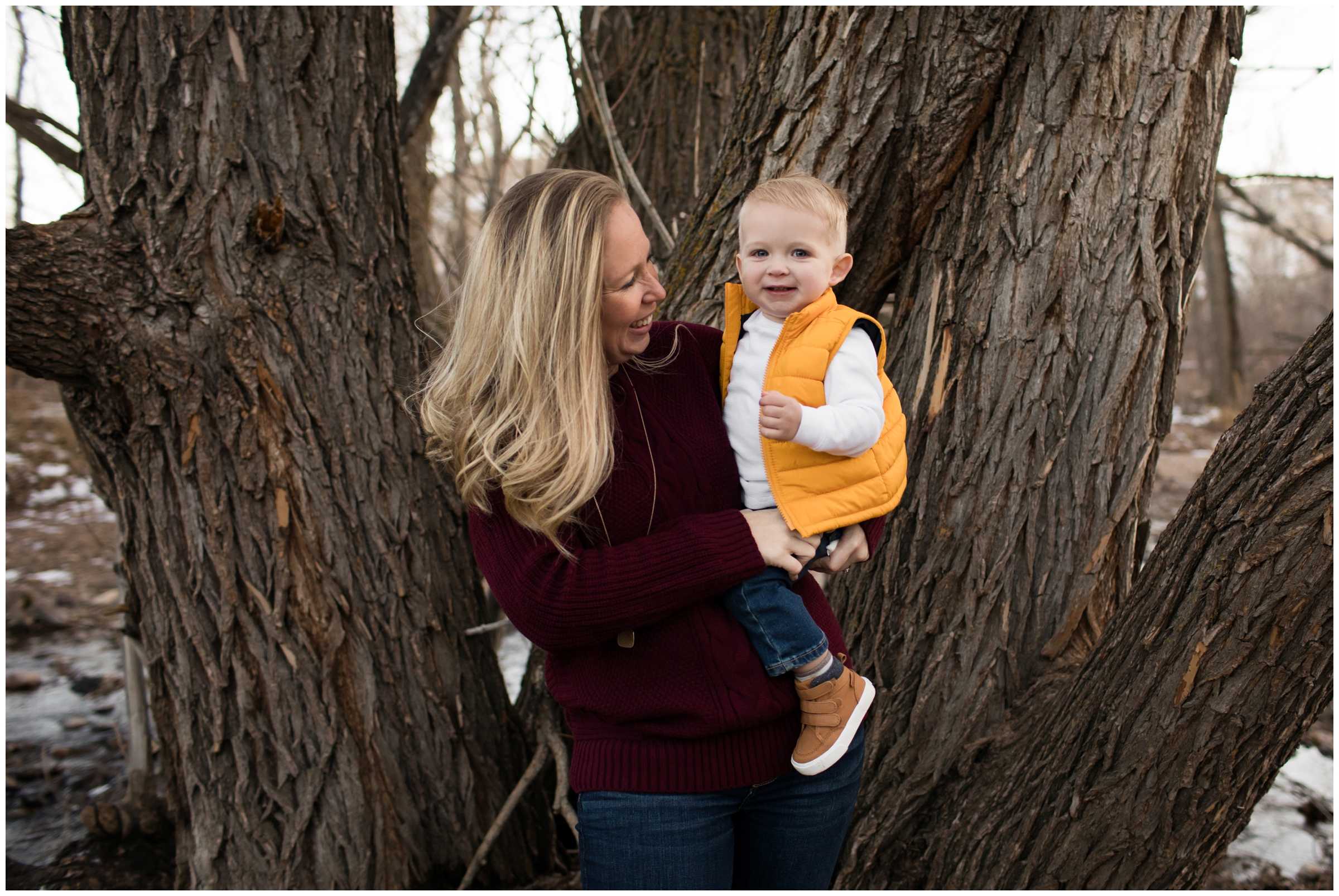 mom holding son during Boulder fall family pictures