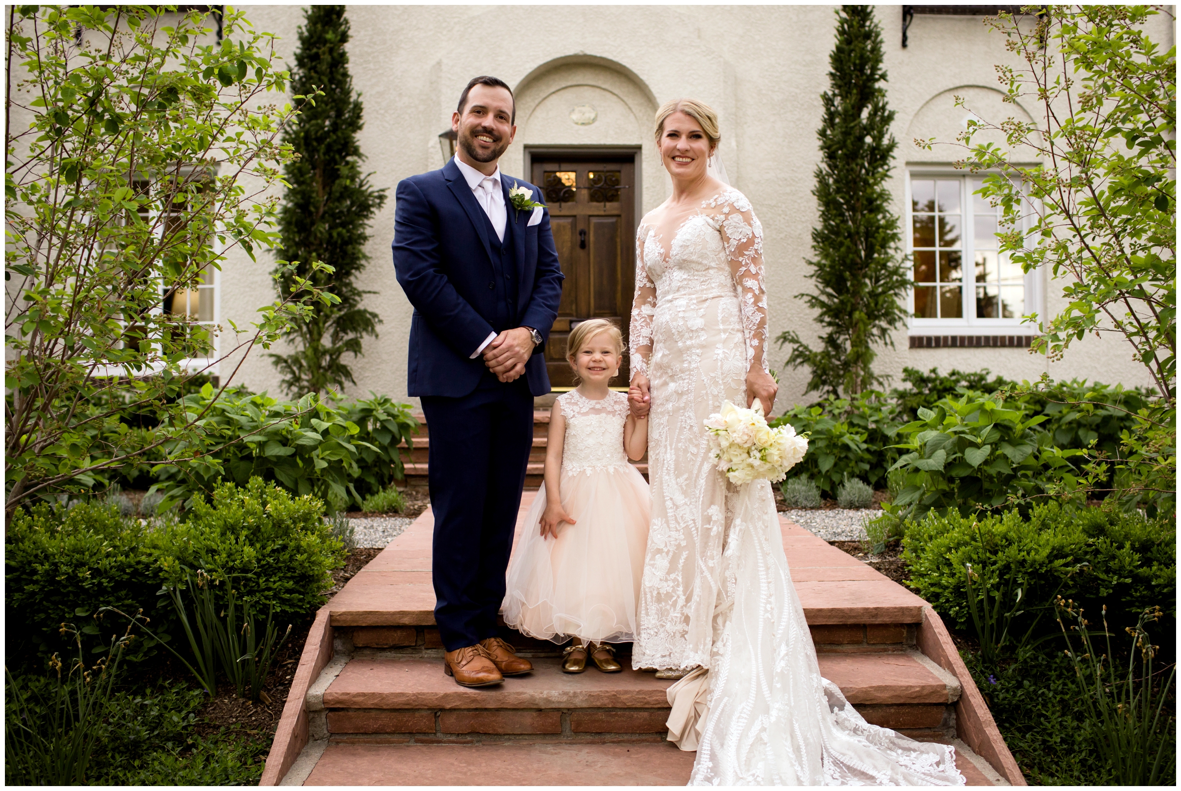 bride and groom posing with daughter during spring Colorado wedding portraits 