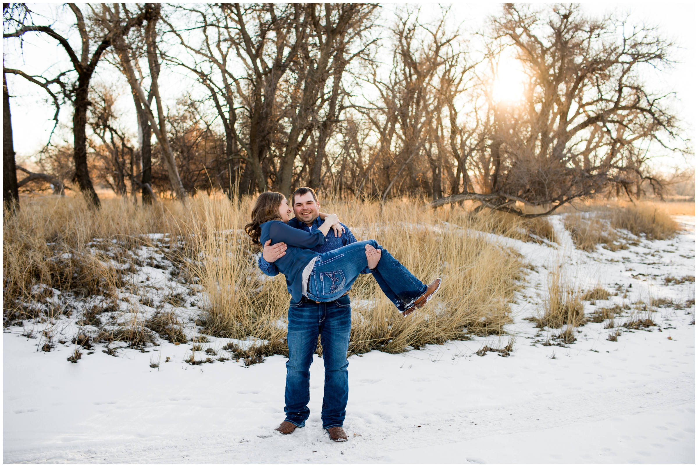 groom holding bride during winter couple's photography session 