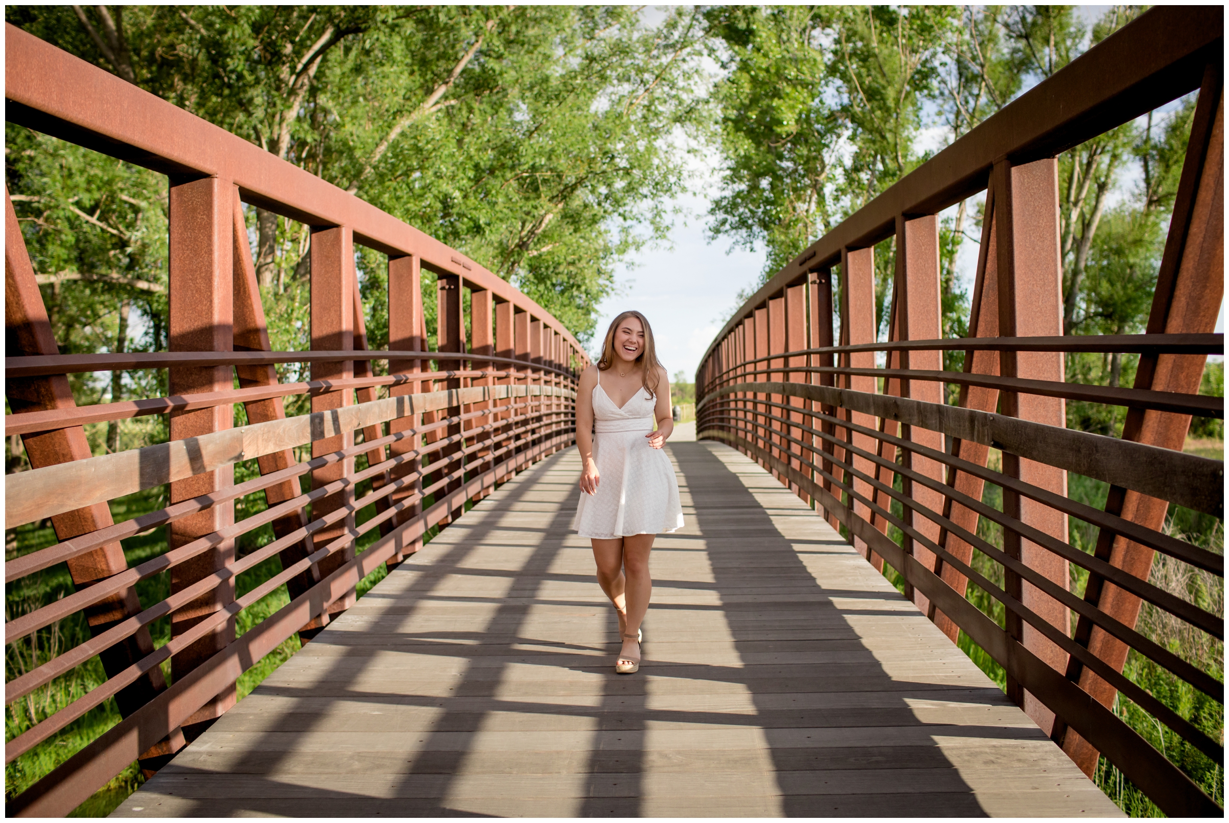 teen walking on bridge at Sandstone Ranch Longmont Colorado senior pictures 