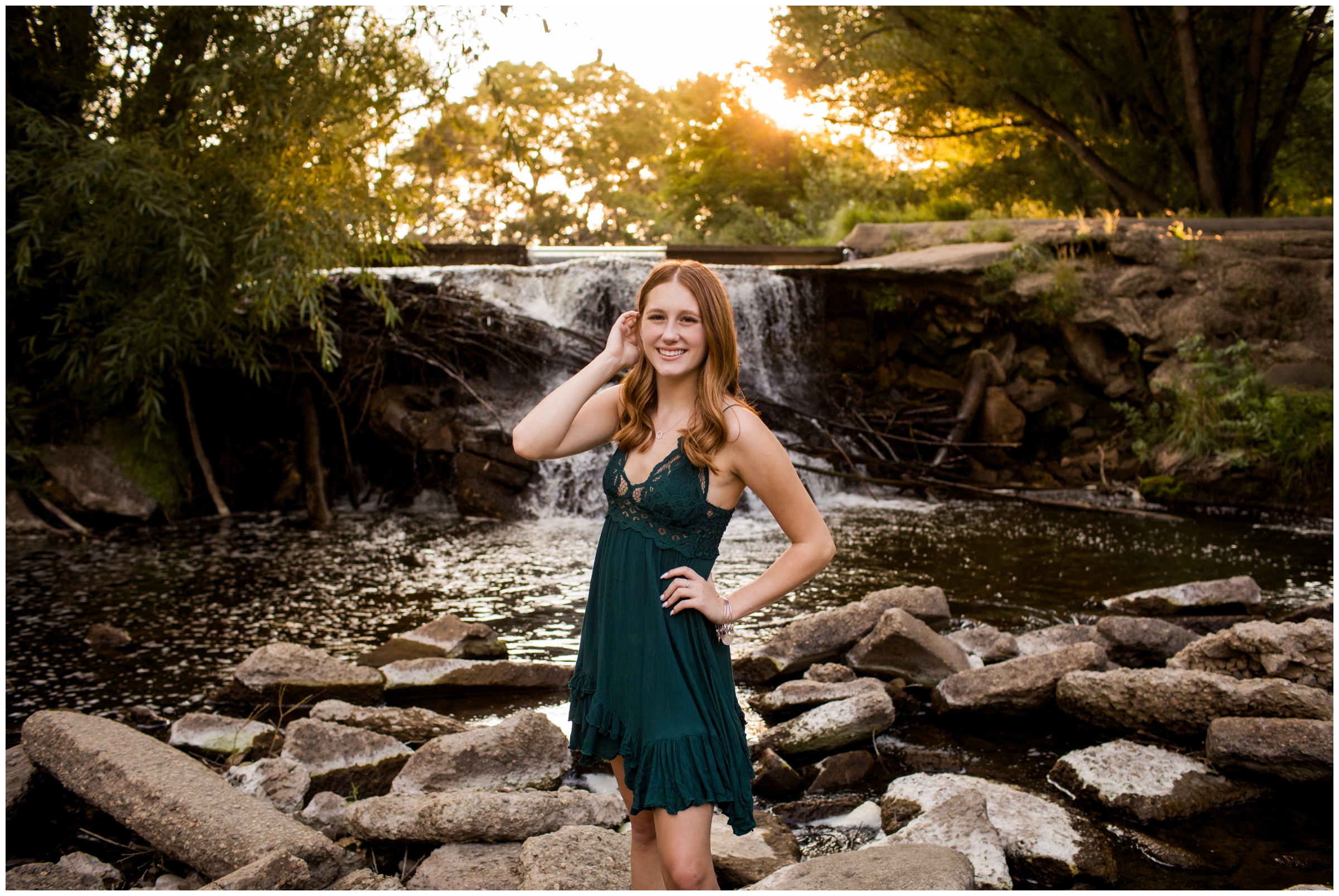 teen posing near waterfall during Colorado senior pictures at Golden Ponds Longmont