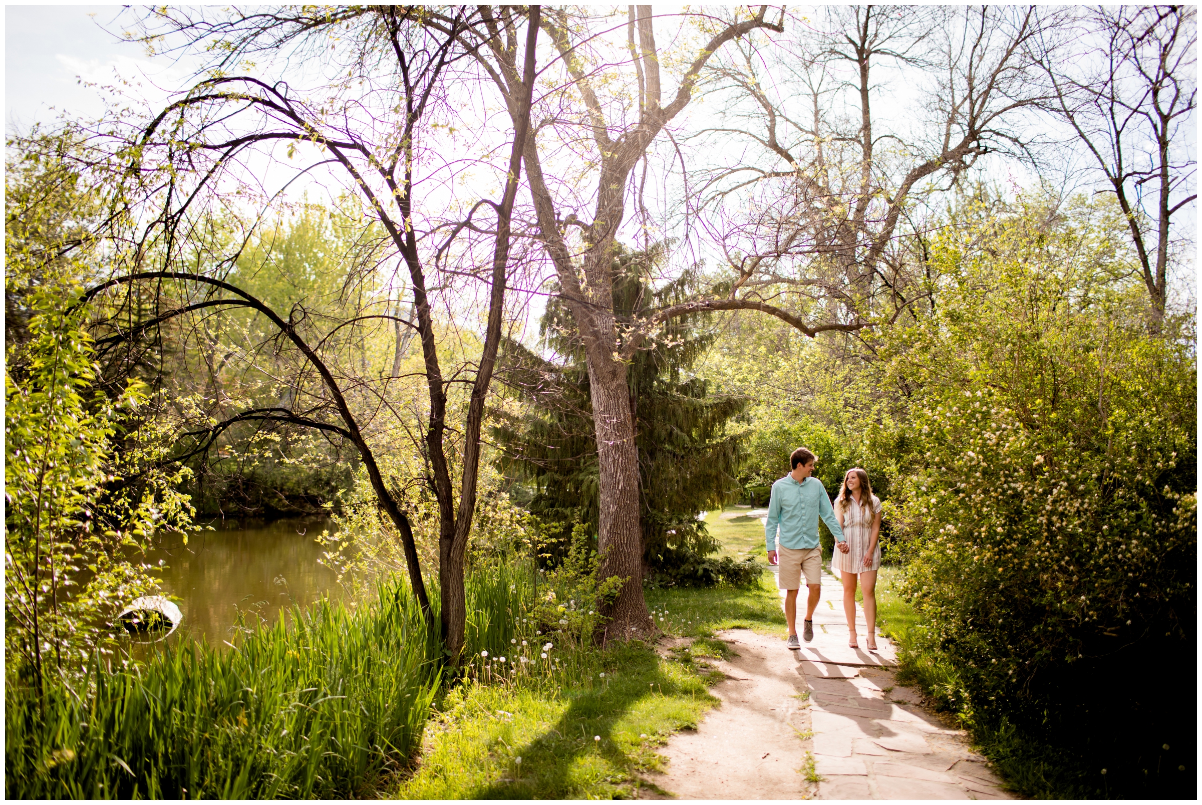 Couple holding hands and walking at University of Colorado Boulder engagement pictures 