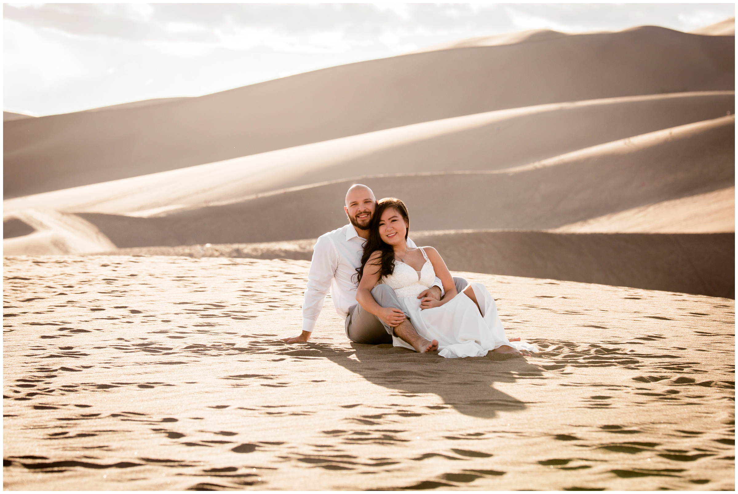 Colorado sand dunes engagement photos by CO wedding photographer Plum Pretty Photography