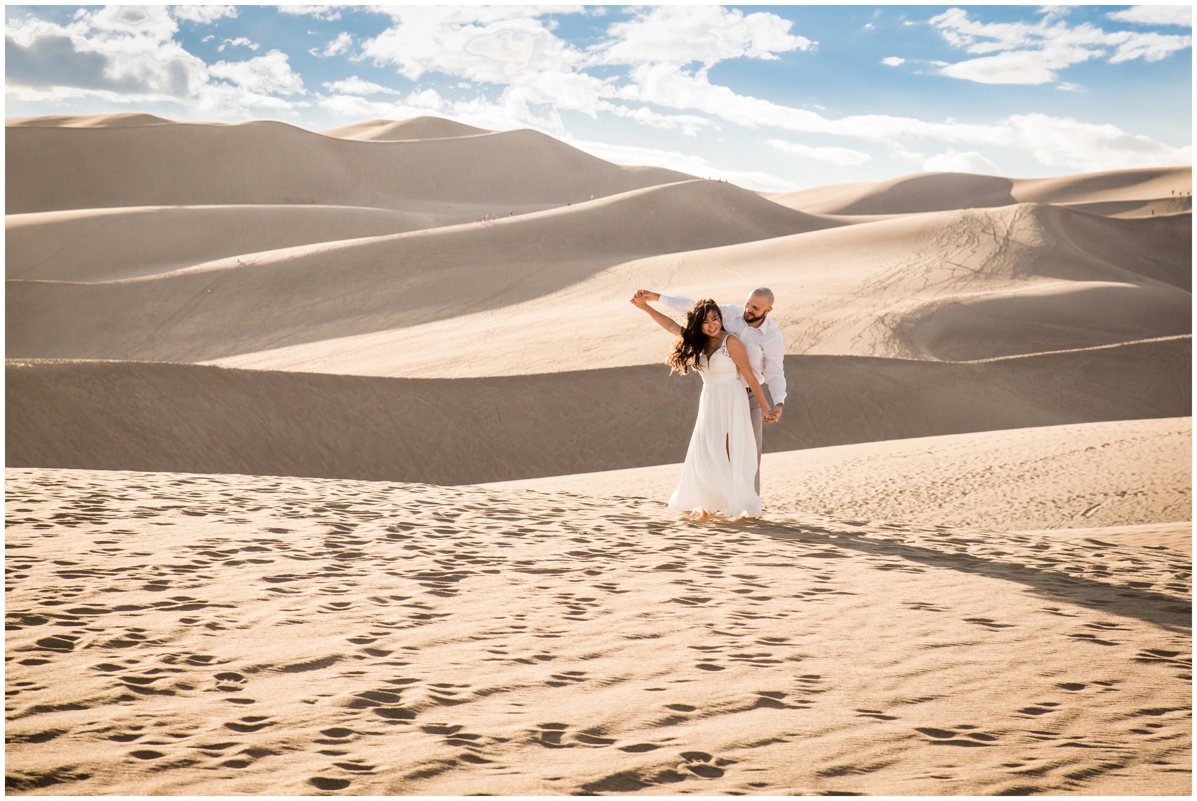 Colorado sand dunes engagement photos by CO wedding photographer Plum Pretty Photography