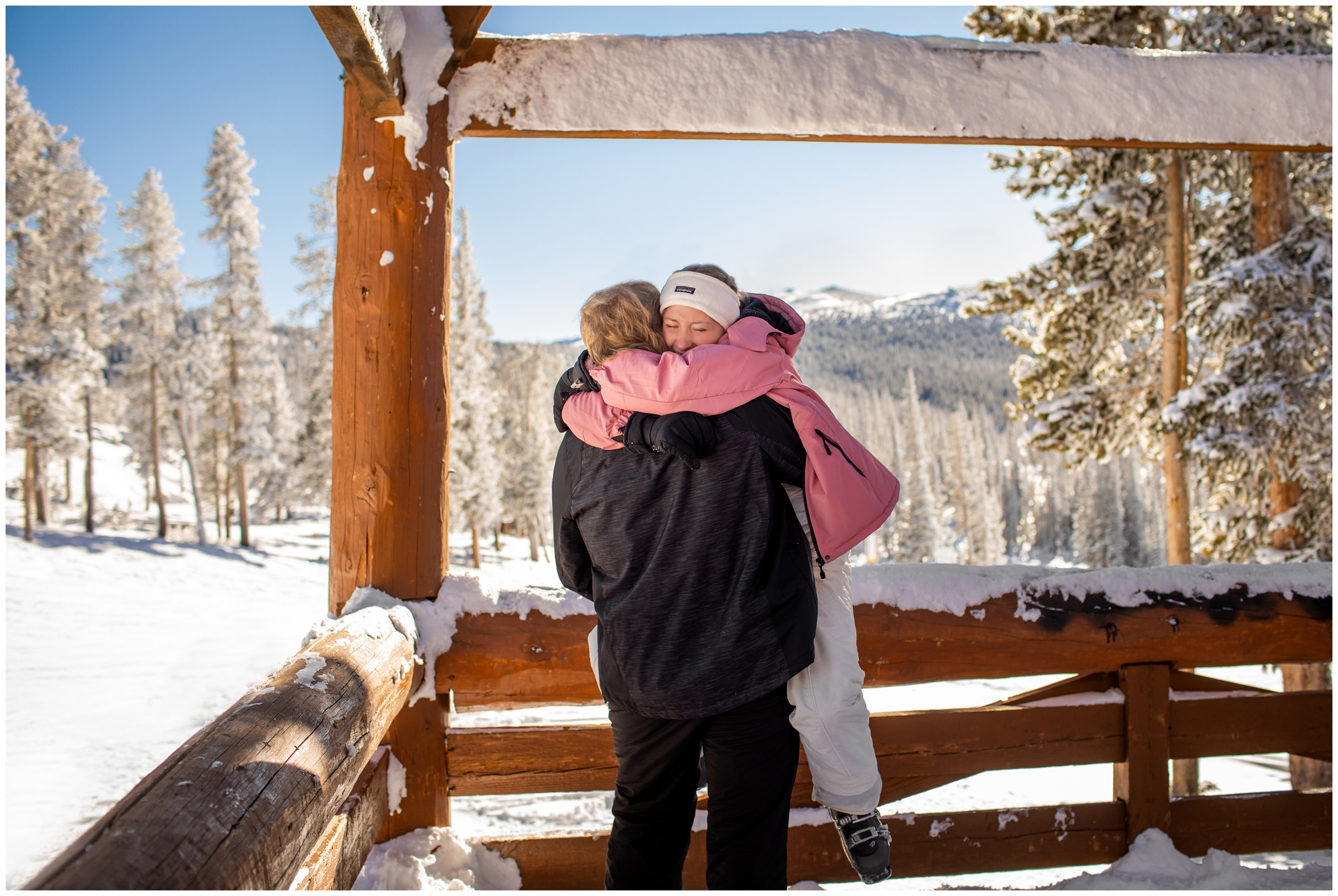 couple hugging after getting engaged in winter park by Colorado proposal photographer Plum Pretty Photography 