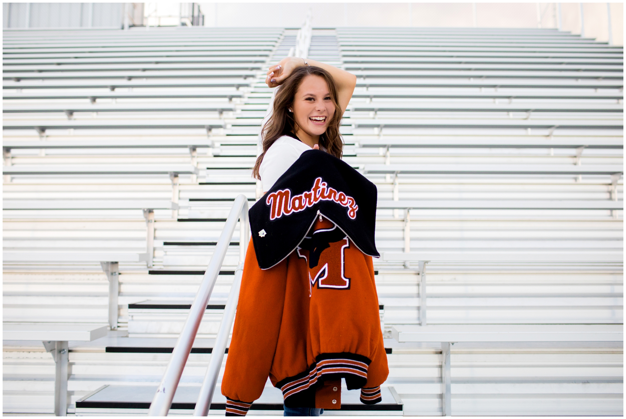 teen posing on bleachers at Mead High school during Colorado senior photography session 