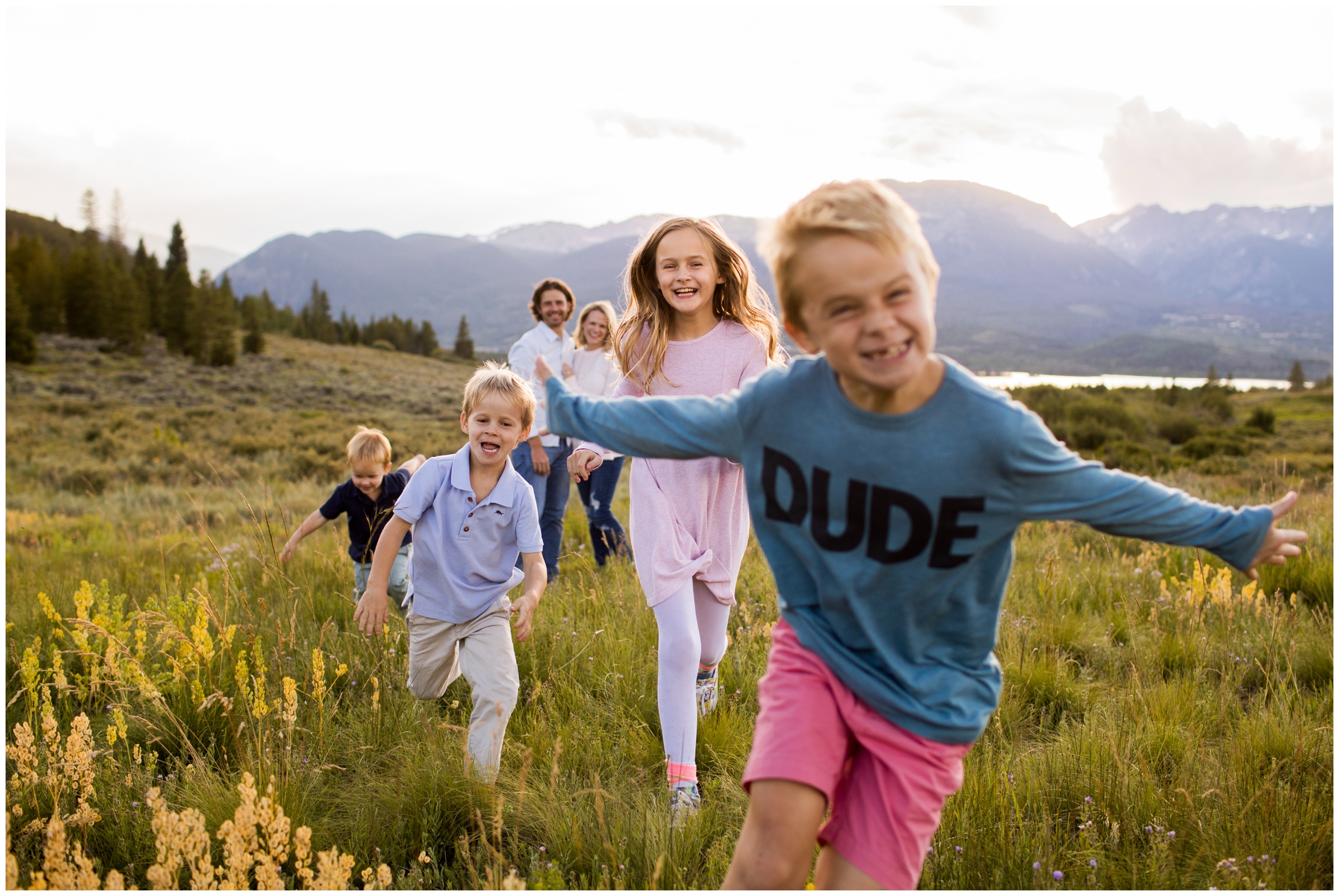 kids running towards the camera during candid family photos at sapphire point overlook