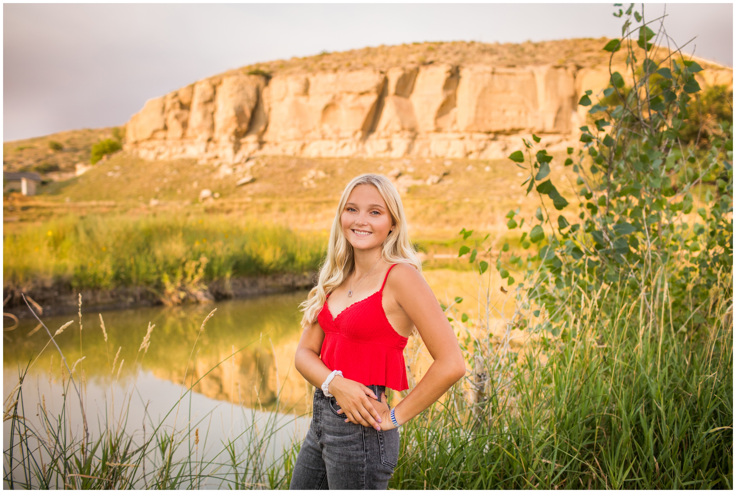 teen girl posing in front of rock formations at Sandstone Ranch Longmont