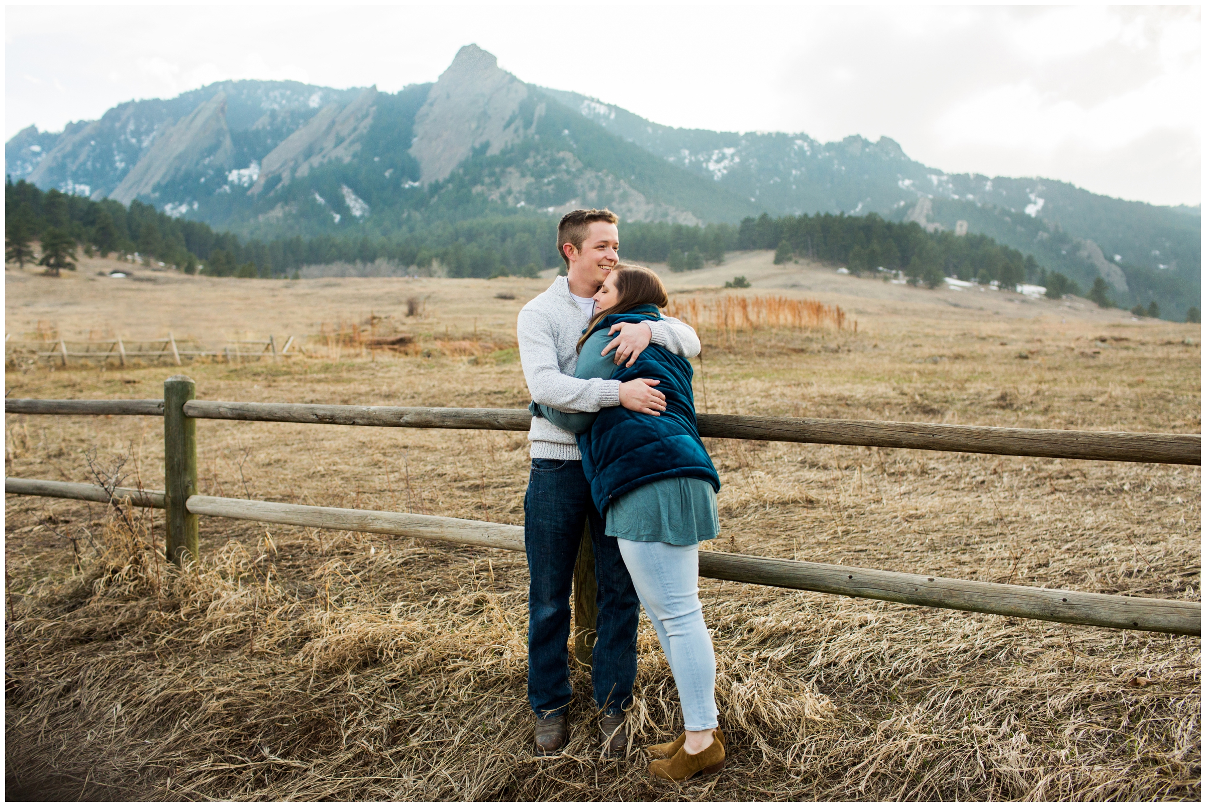 couple hugging during springtime Chautauqua couple's portraits in Colorado 