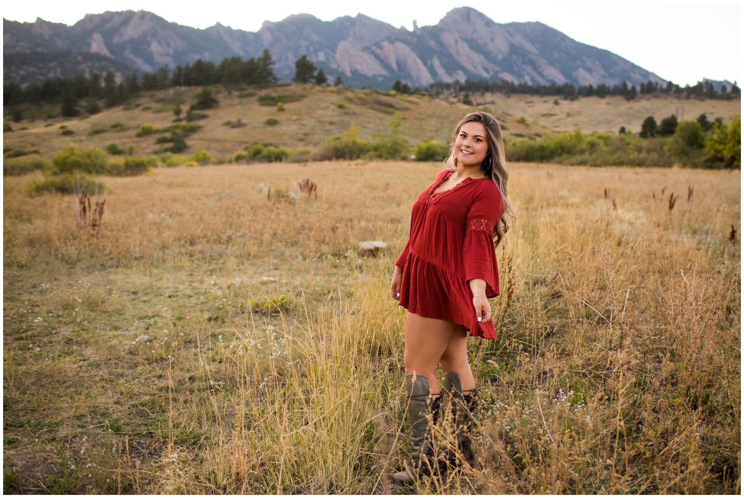 Teen twirling in dress during Boulder flatirons senior photography session 