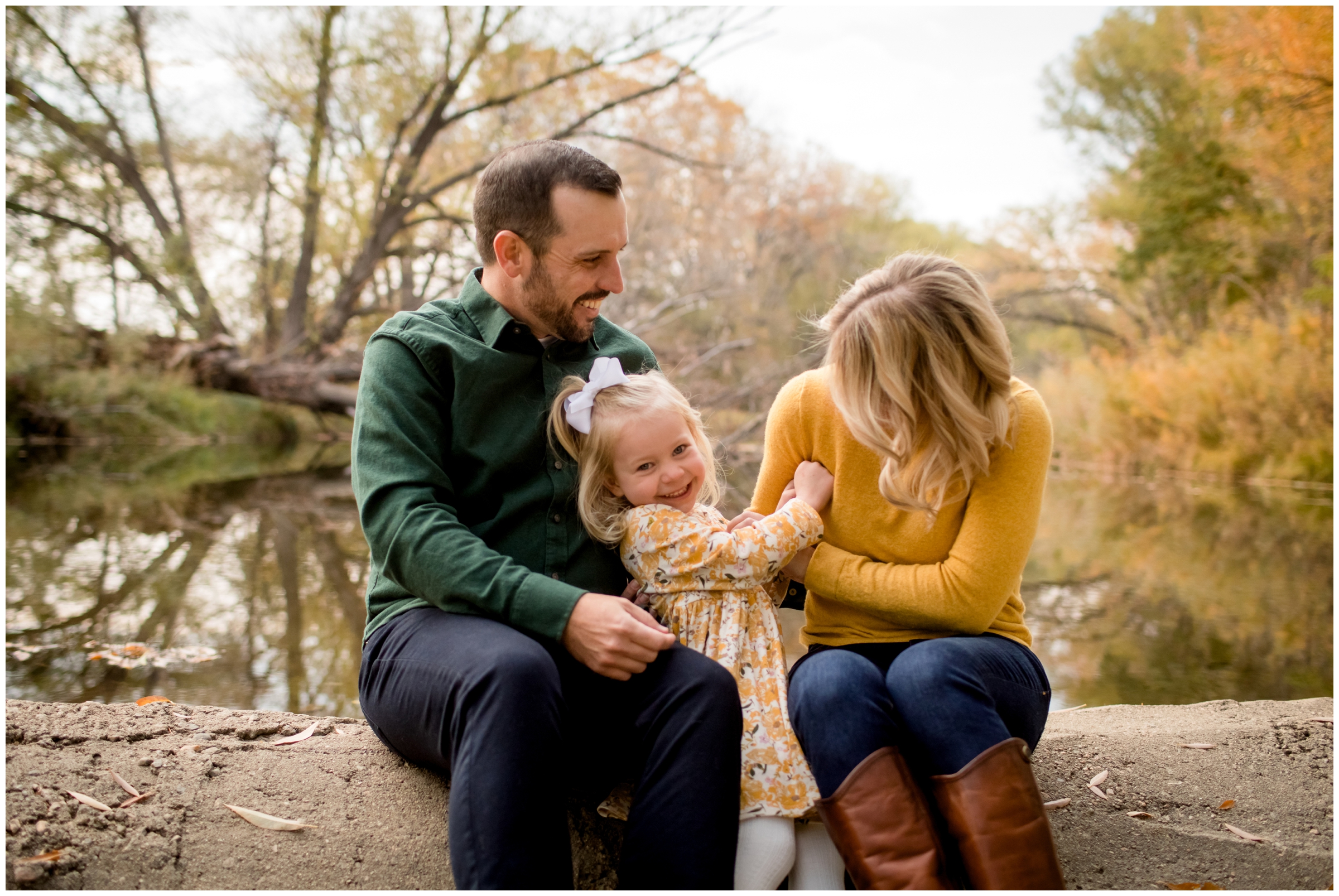 family tickle fight during Colorado fall mini sessions in boulder county 