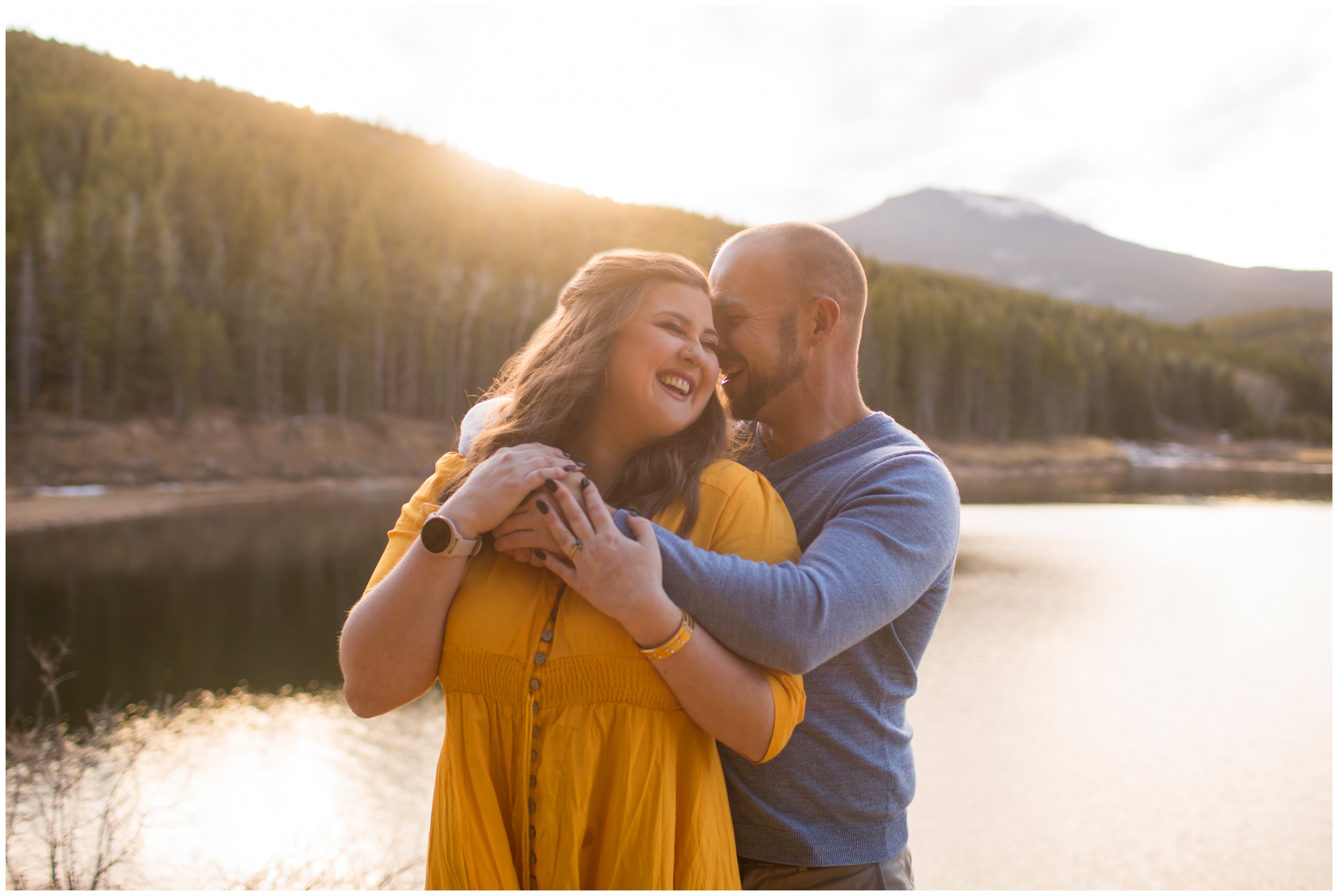 sunny engagement portraits next to a lake in the Colorado mountains 