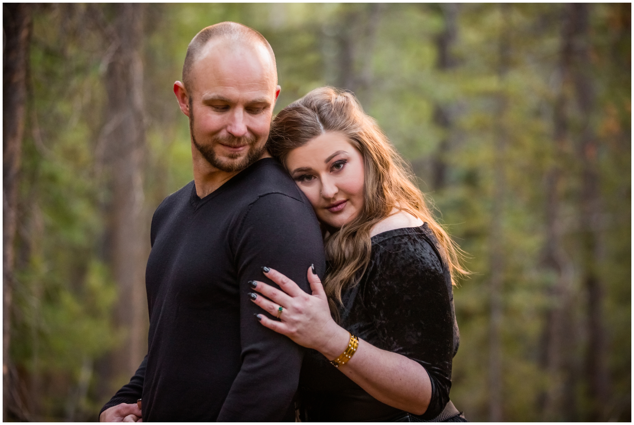 Moody forest engagement pictures in evergreen Colorado 