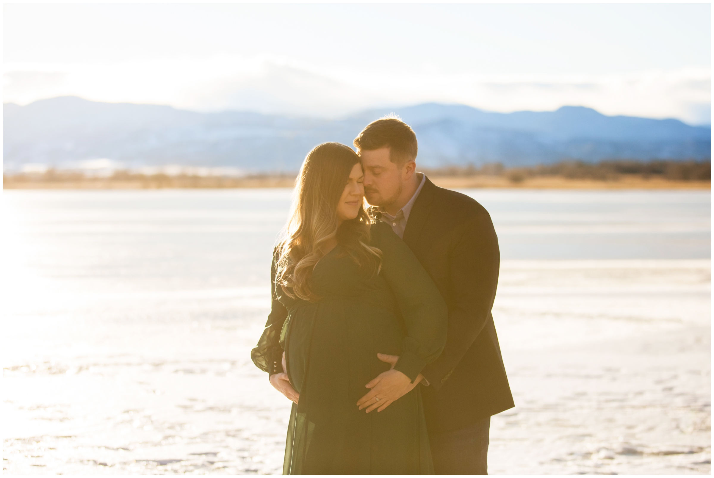 Colorado winter maternity portraits with mountains in background 