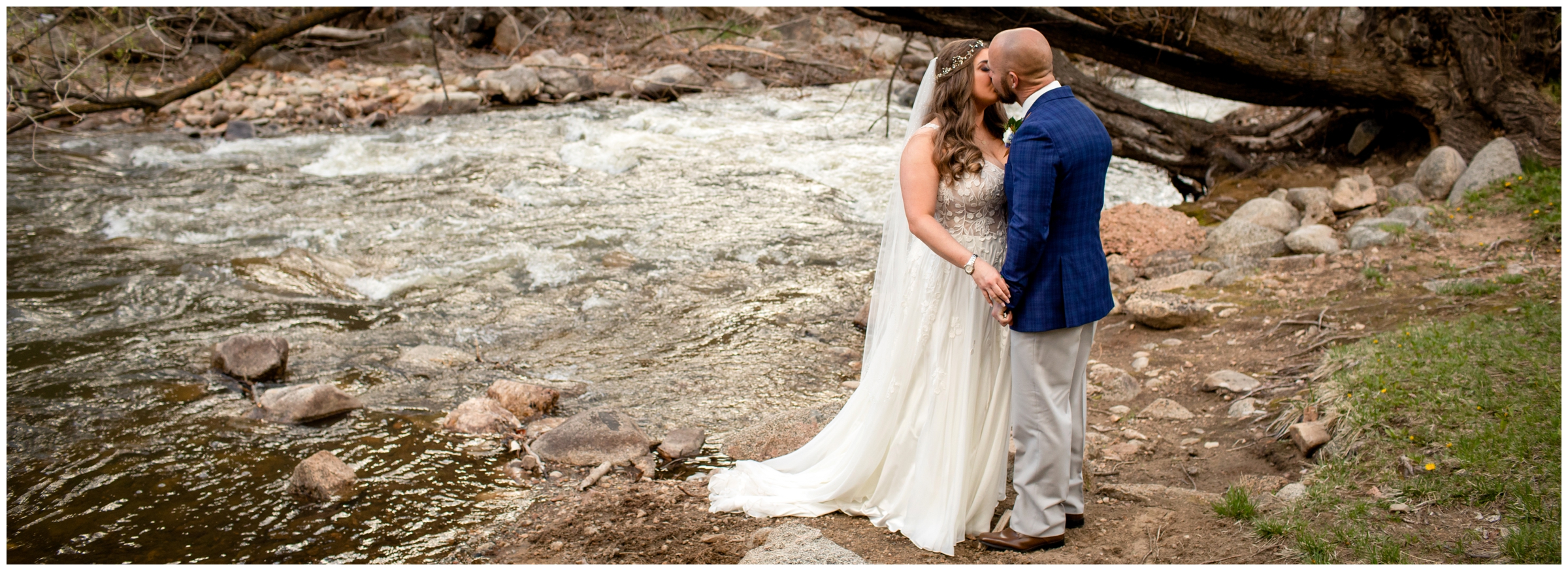 couple kissing next to river during couple's pictures at Boulder Creek by Wedgewood Weddings 
