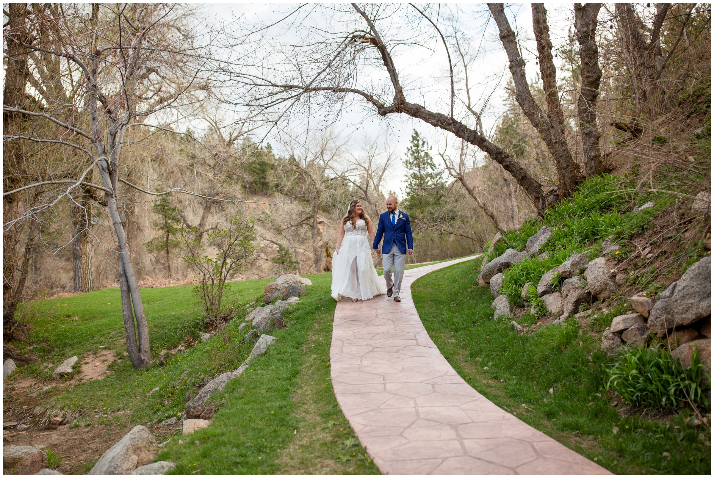 couple walking down a path at Boulder wedding pictures at Wedgewood Boulder Creek