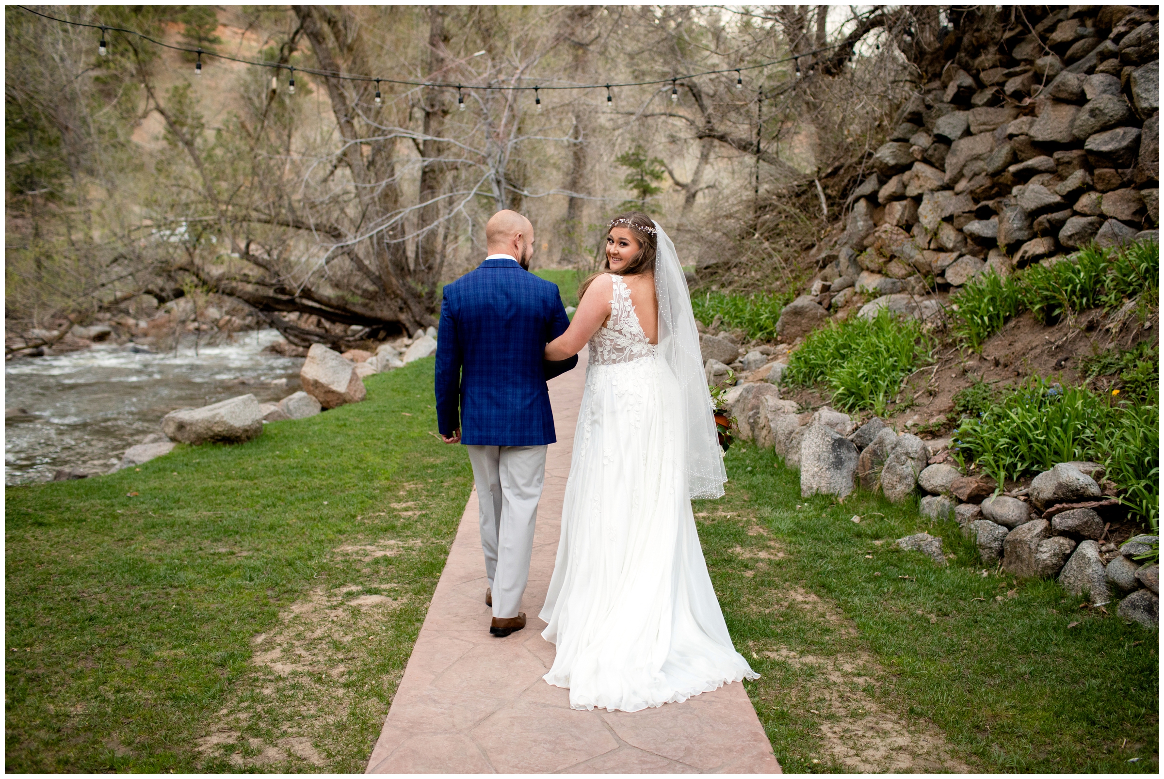 couple walking away during river wedding portraits in Boulder Colorado 