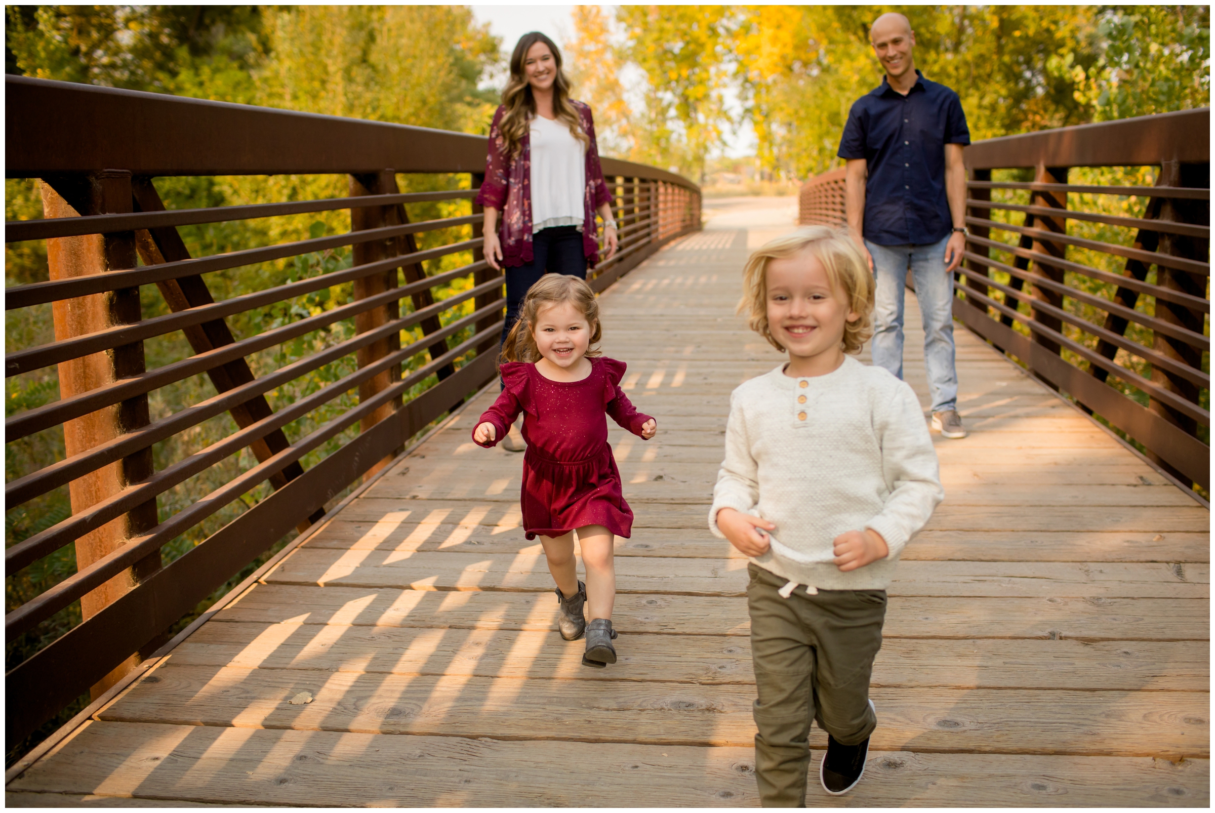 Kids running on bridge at golden ponds during Longmont family pictures 
