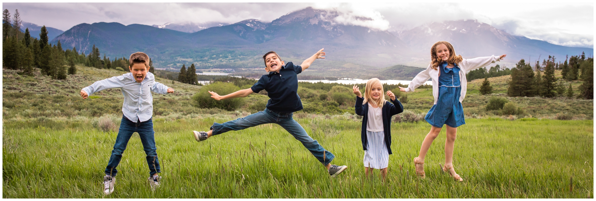 kids jumping in the air during Windy Point Campground Breckenridge family photography session 