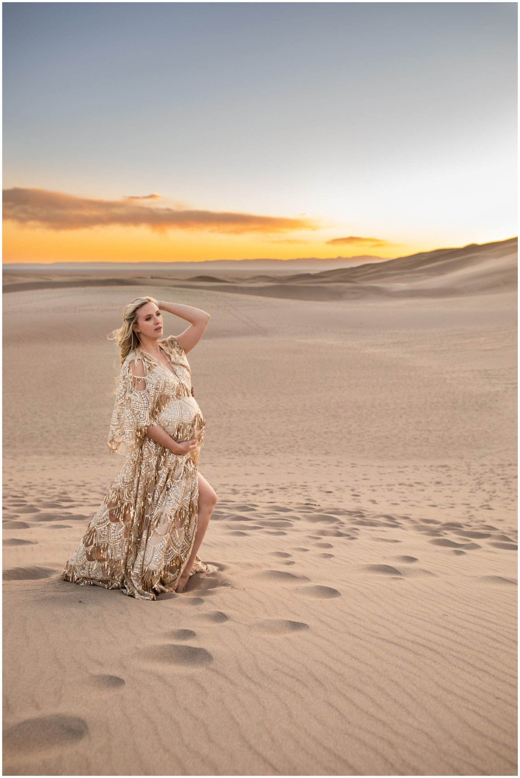 unique sunset maternity photos at the Great Sand Dunes in southern Colorado 