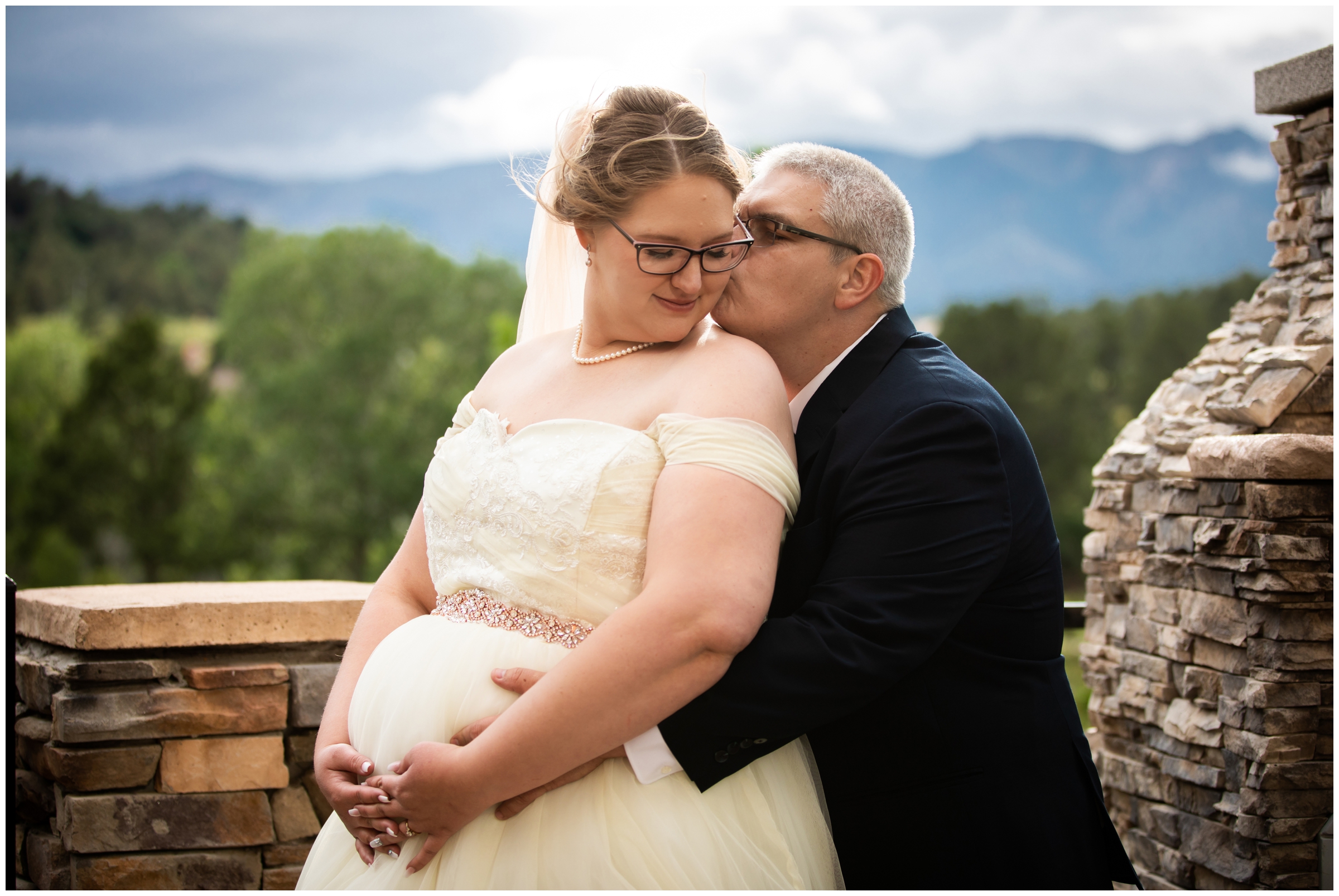 pregnant bride and groom posing for wedding maternity portraits in Colorado Springs 
