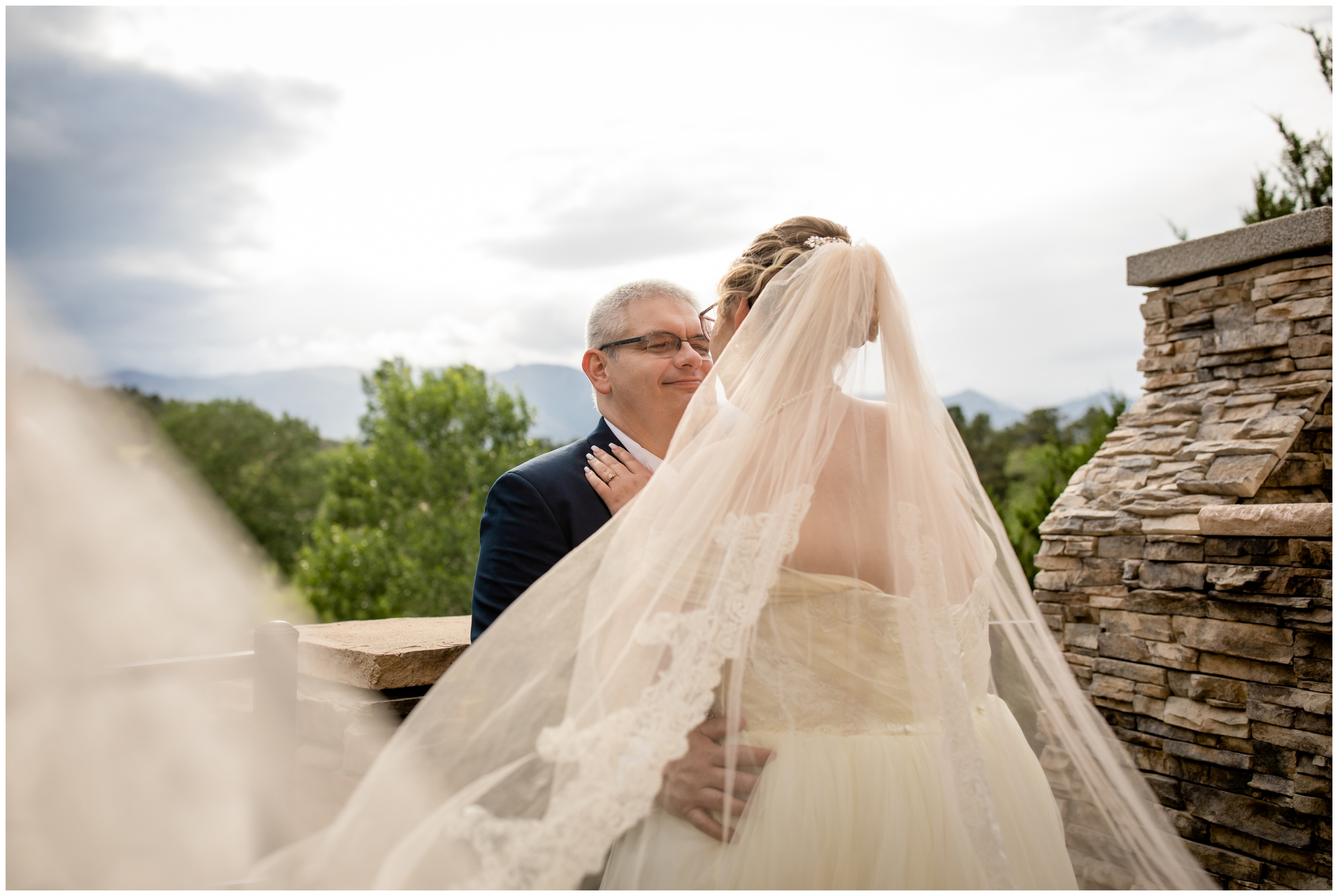 unique wedding pictures with long cathedral veil at intimate Colorado Springs wedding 