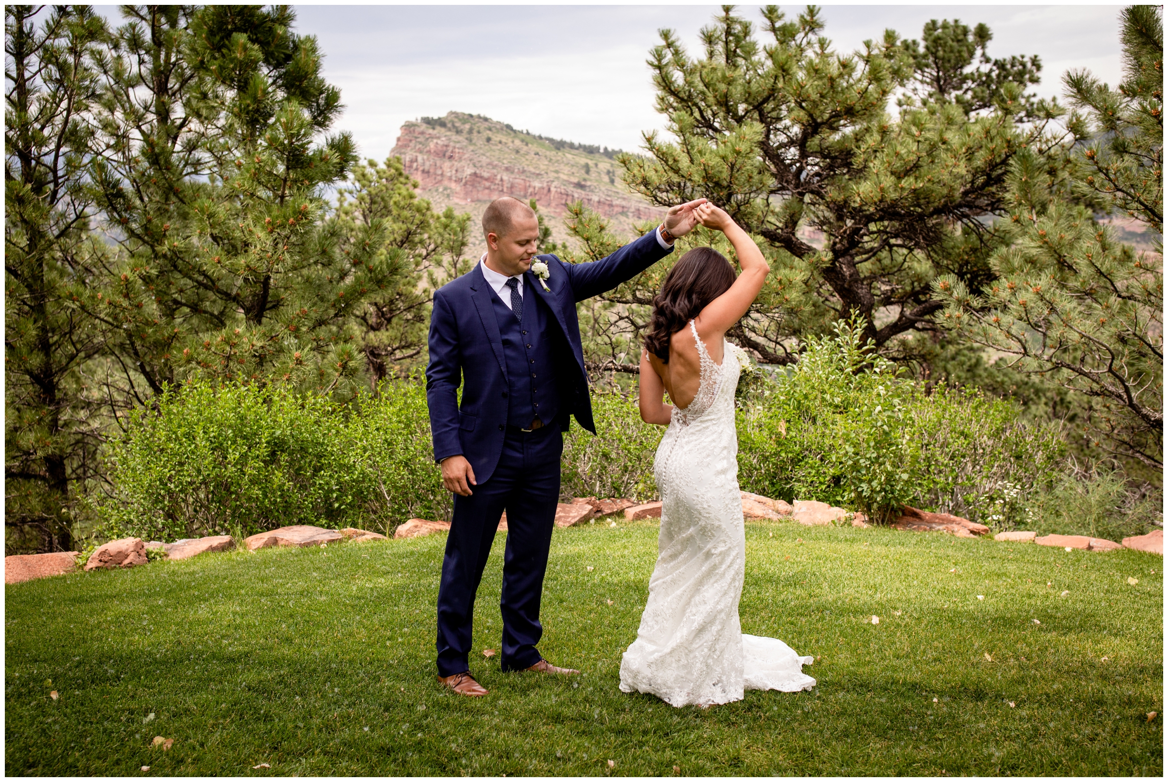 couple dancing with mountains in background during lionscrest wedding photos 