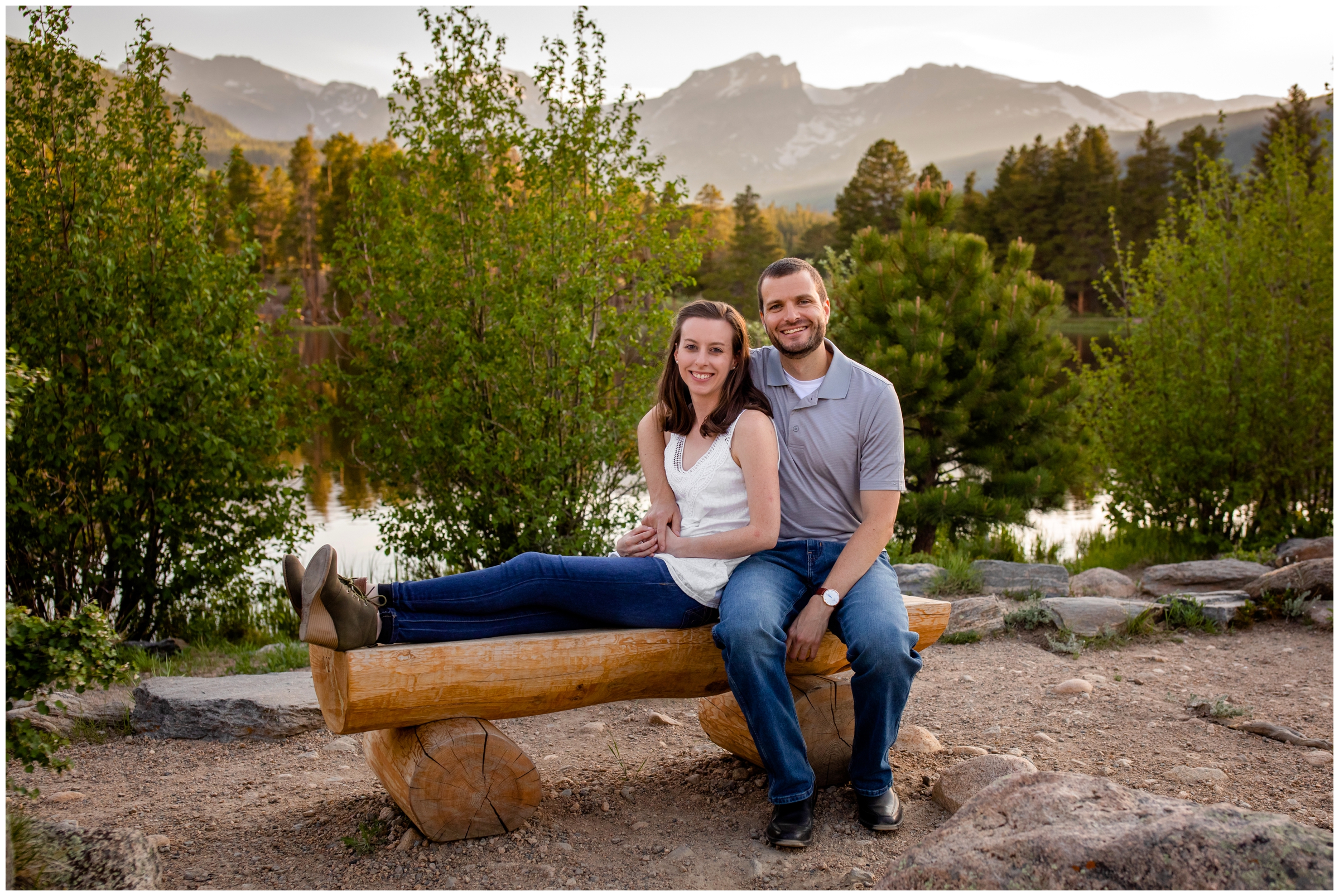 couple posing on bench during Colorado lake engagement pictures in RMNP