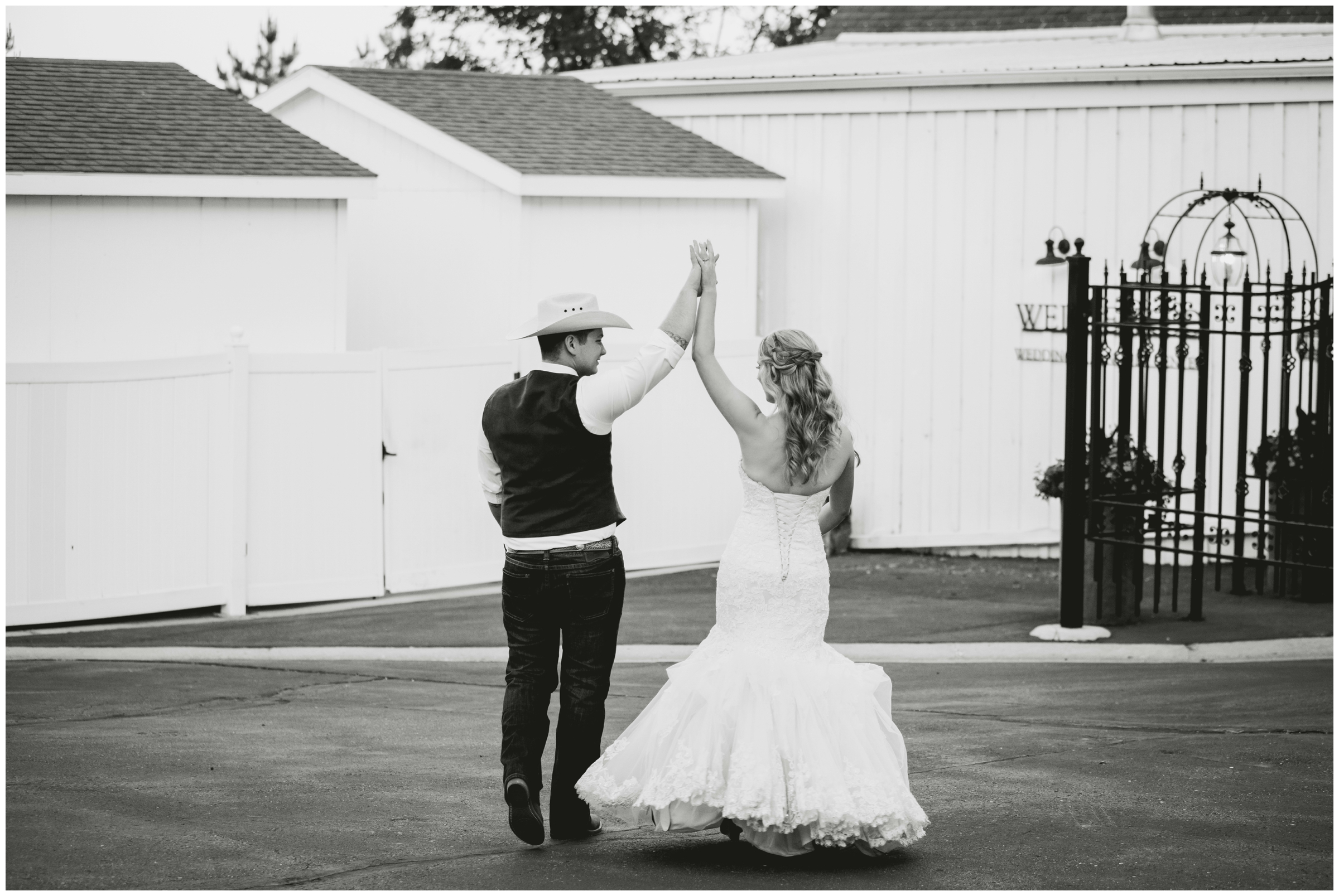 couple dancing in parking lot at Fort Collins Colorado wedding photos