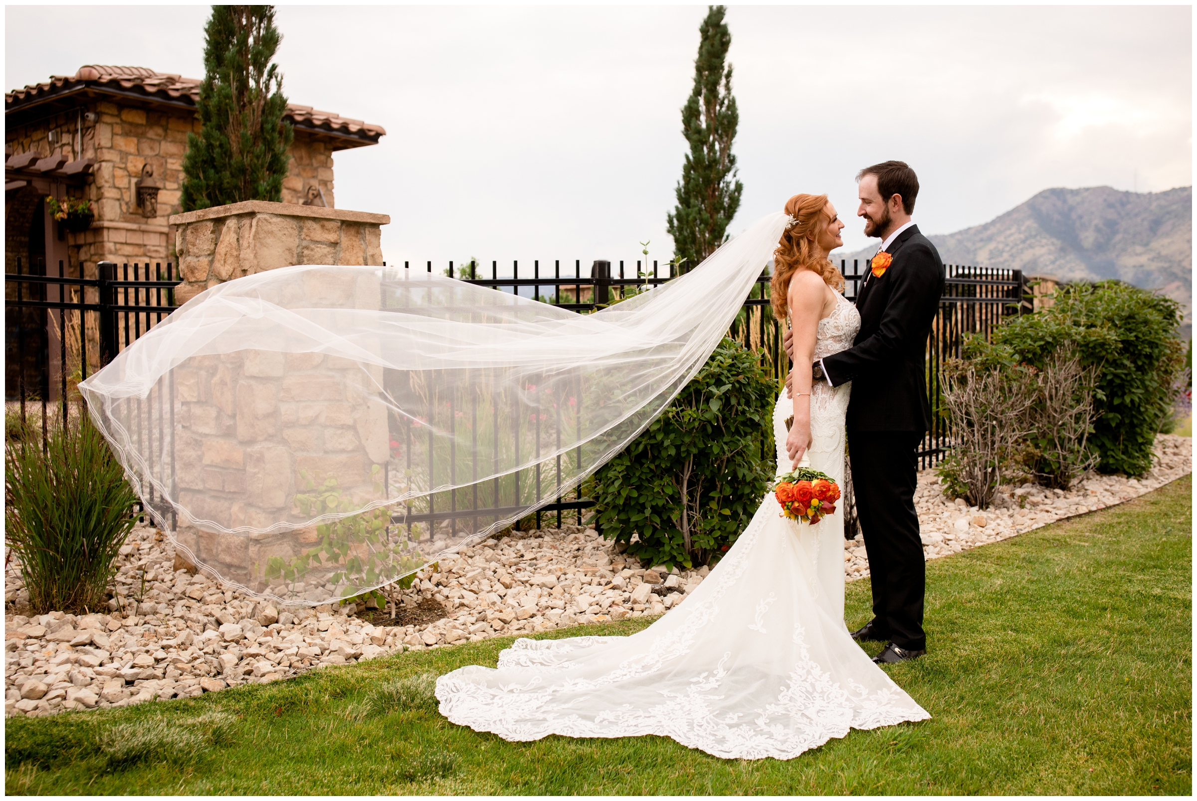 brides veil floating in the wind during tuscan inspired wedding in Colorado at the retreat at solterra
