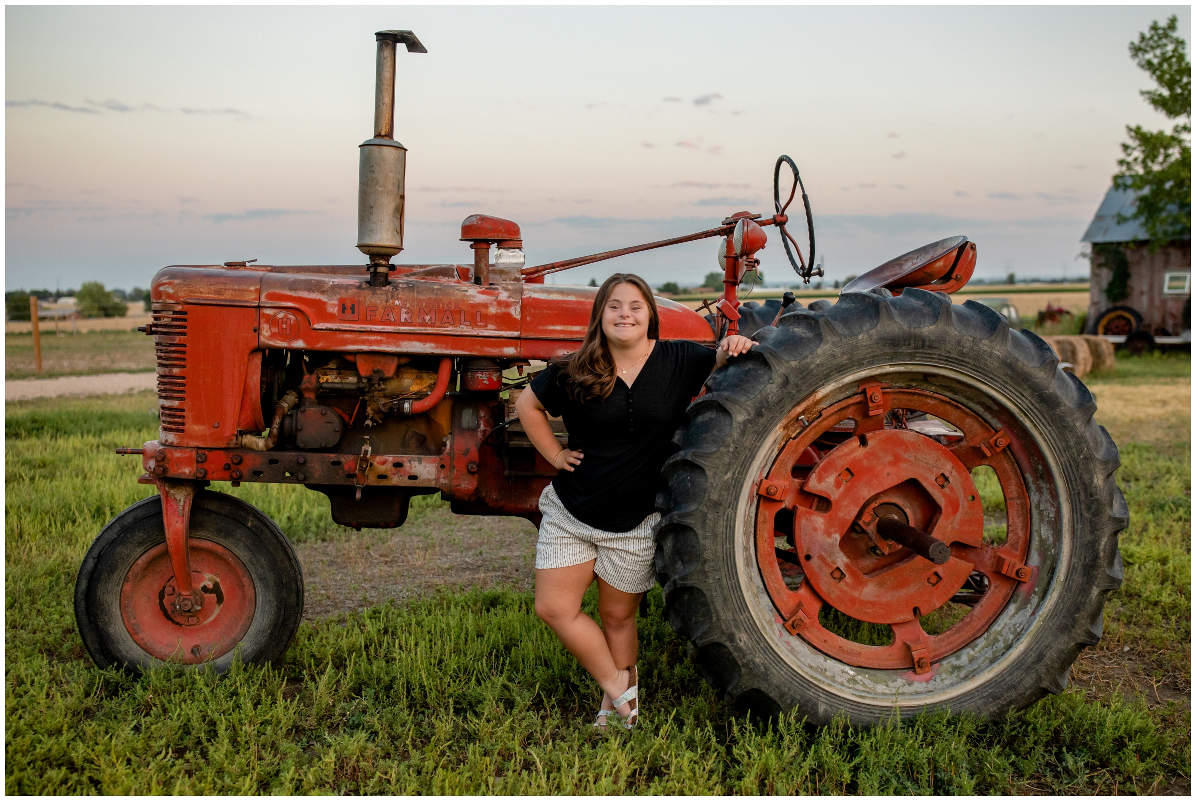 Rustic senior photography session with a tractor in northern Colorado 
