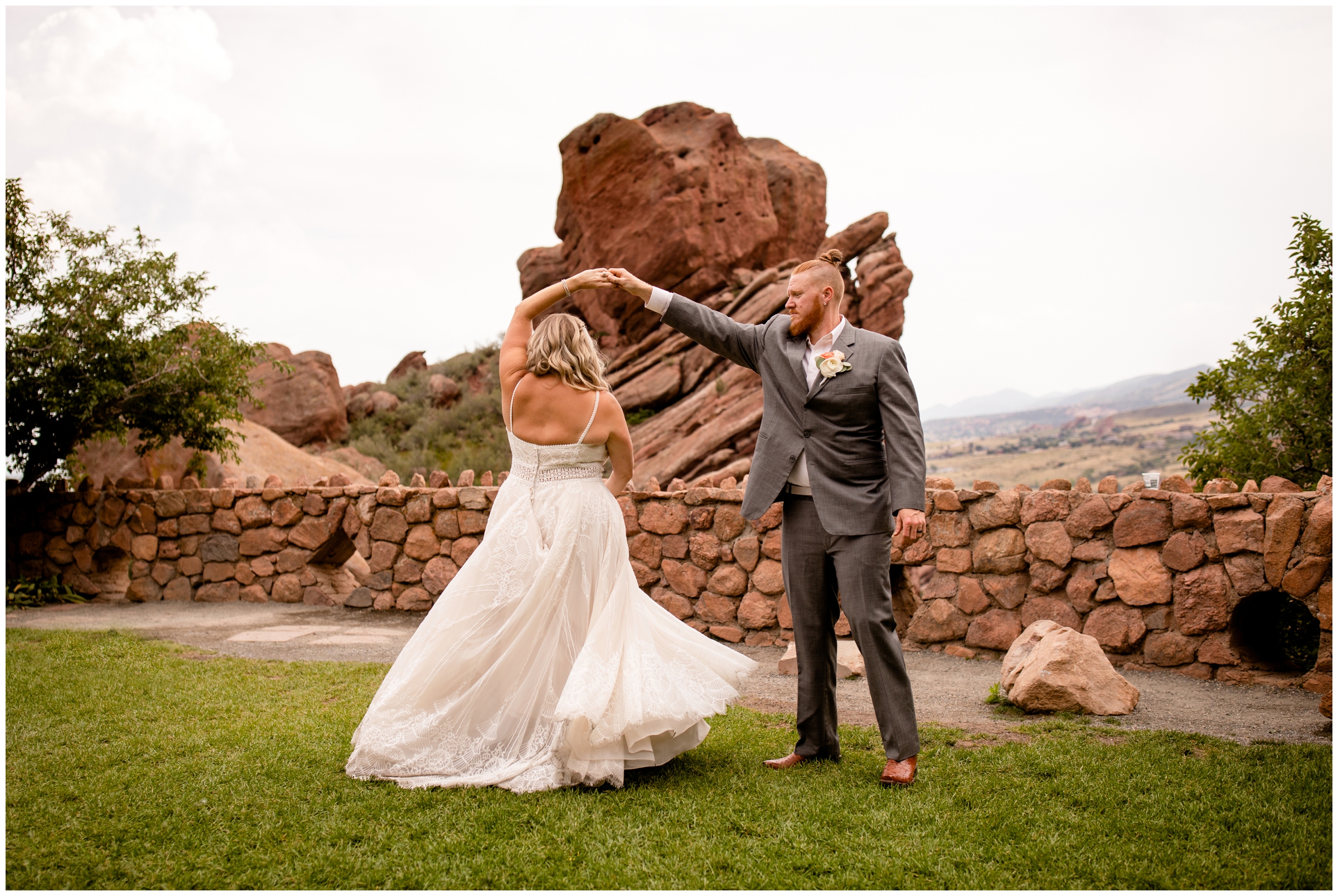 Bride and groom dancing at the red rocks trading post during their Colorado intimate wedding photo session with plum pretty photos 