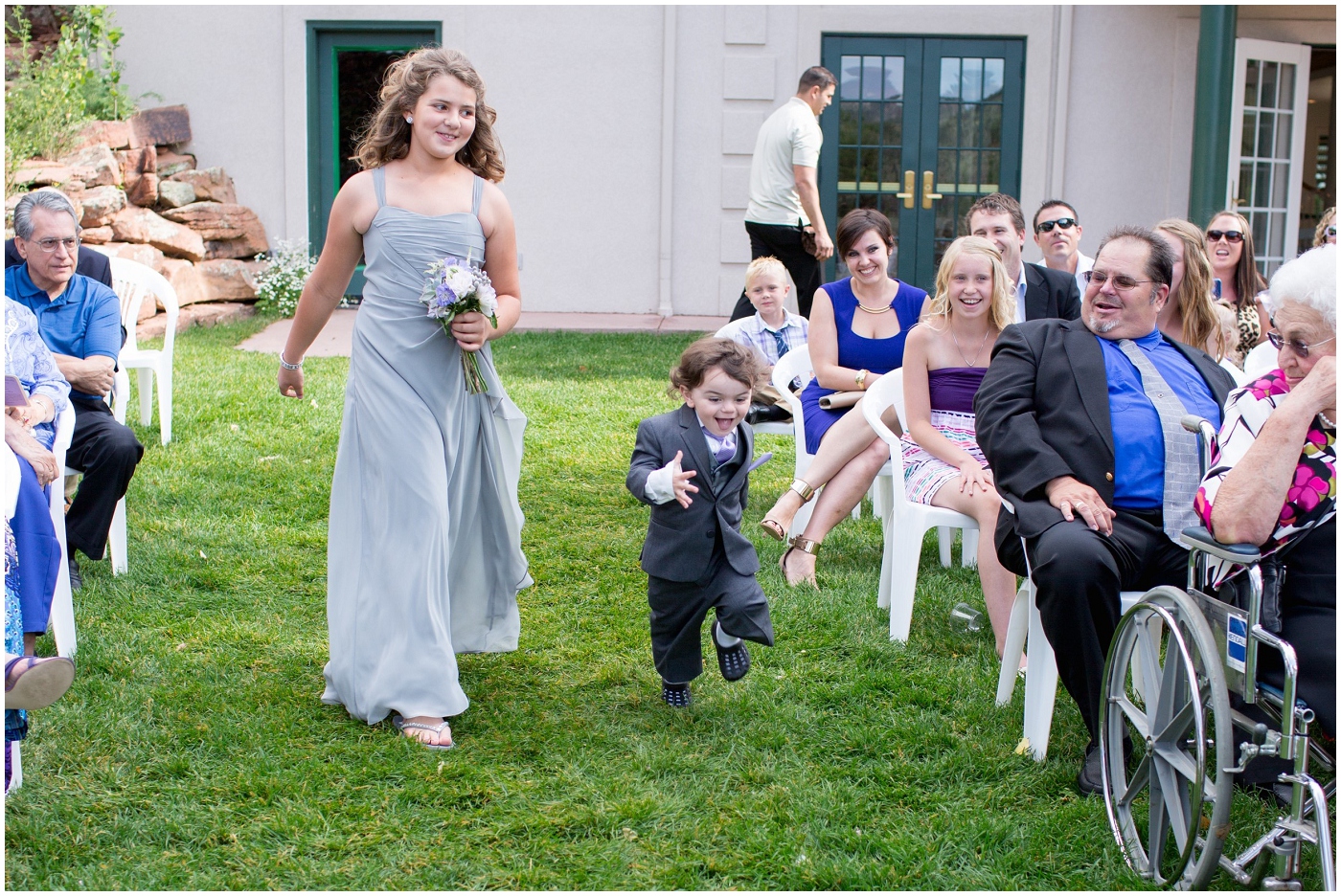 picture of ringbearer running down aisle