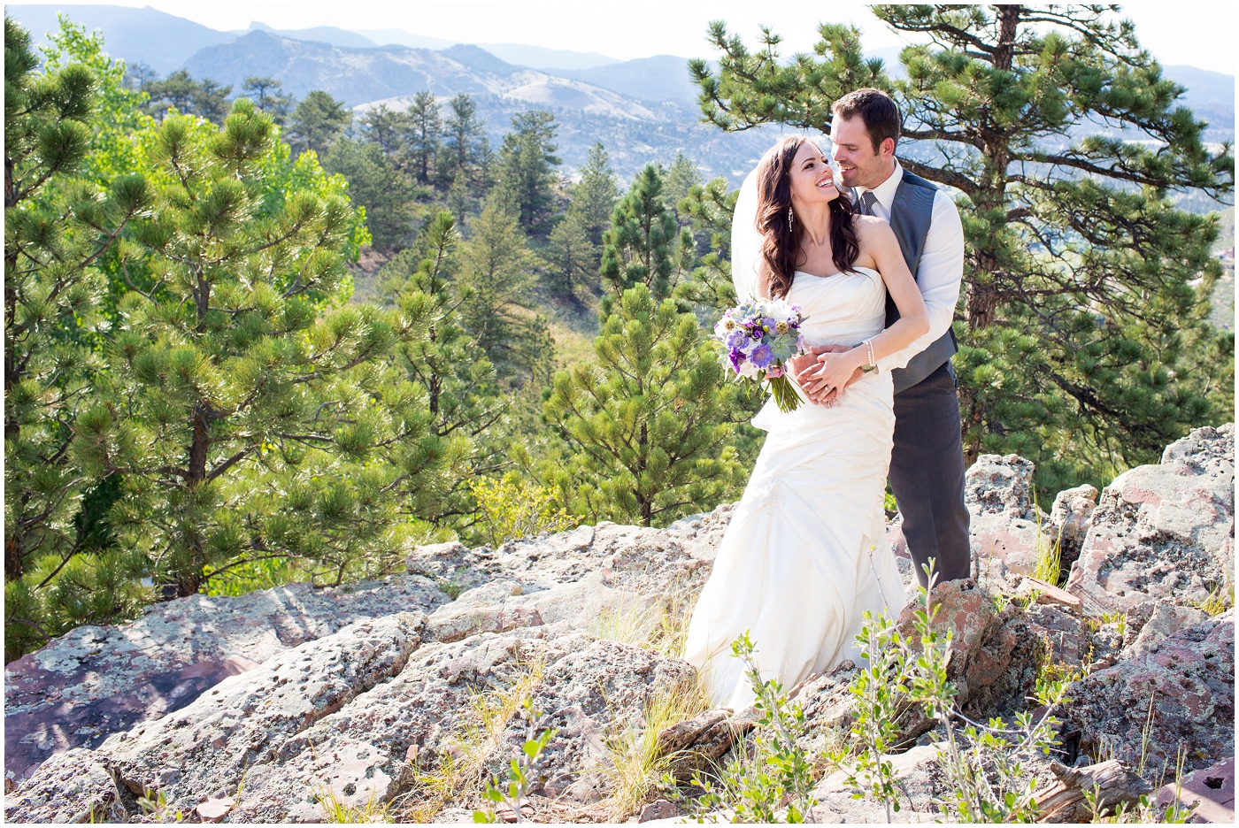 picture of a bride and groom on a cliff