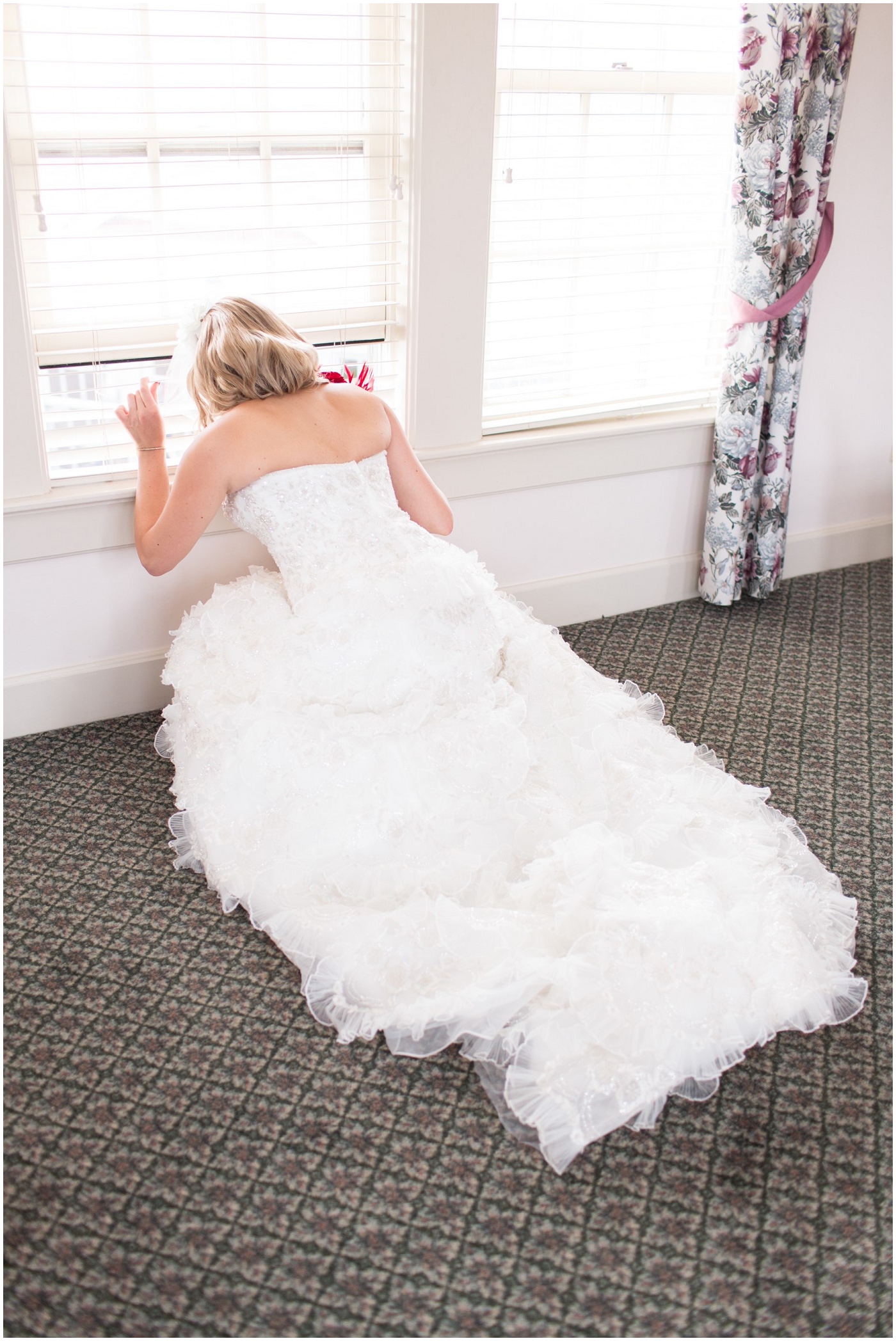 picture of bride looking out the window