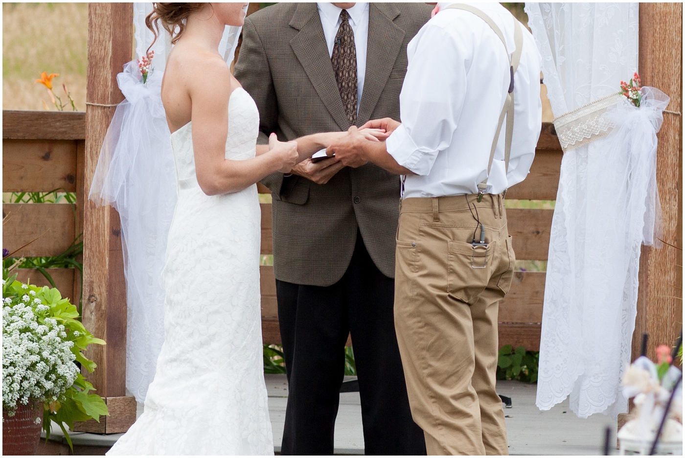 picture of bride and groom exchanging rings