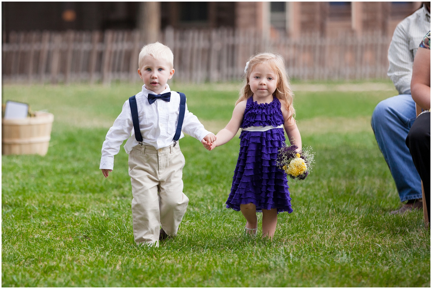 picture of flower girl and ring bearer walking down the aisle