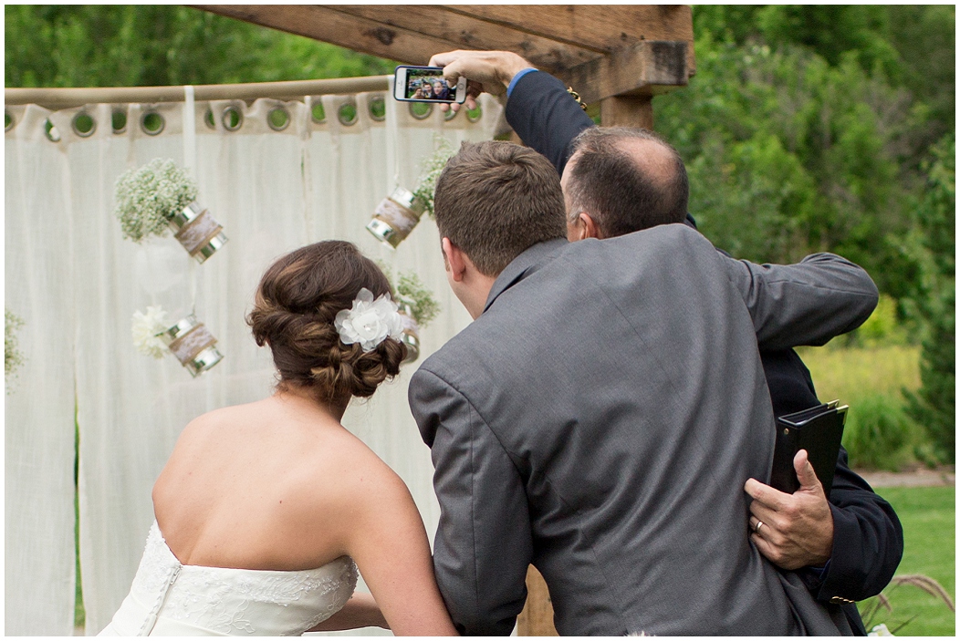 picture of bride and groom taking a selfie