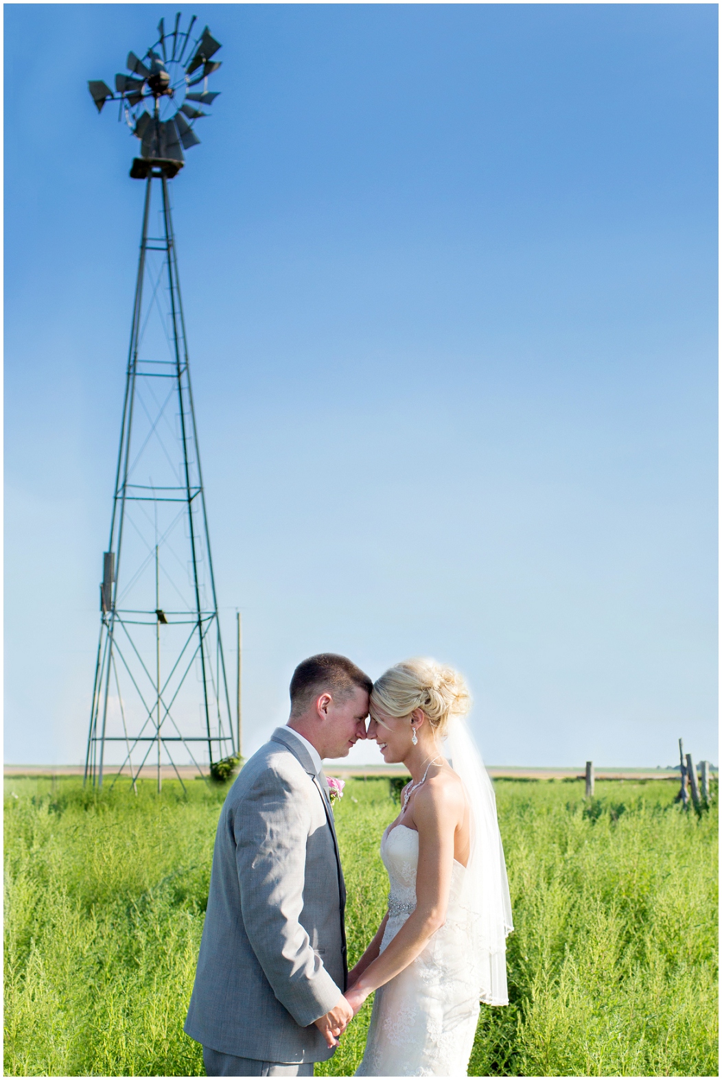 picture of bride and groom with windmill