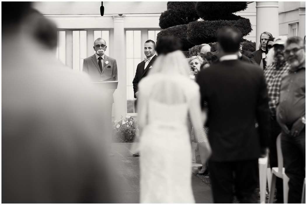 picture of groom's reaction of bride walking down aisle