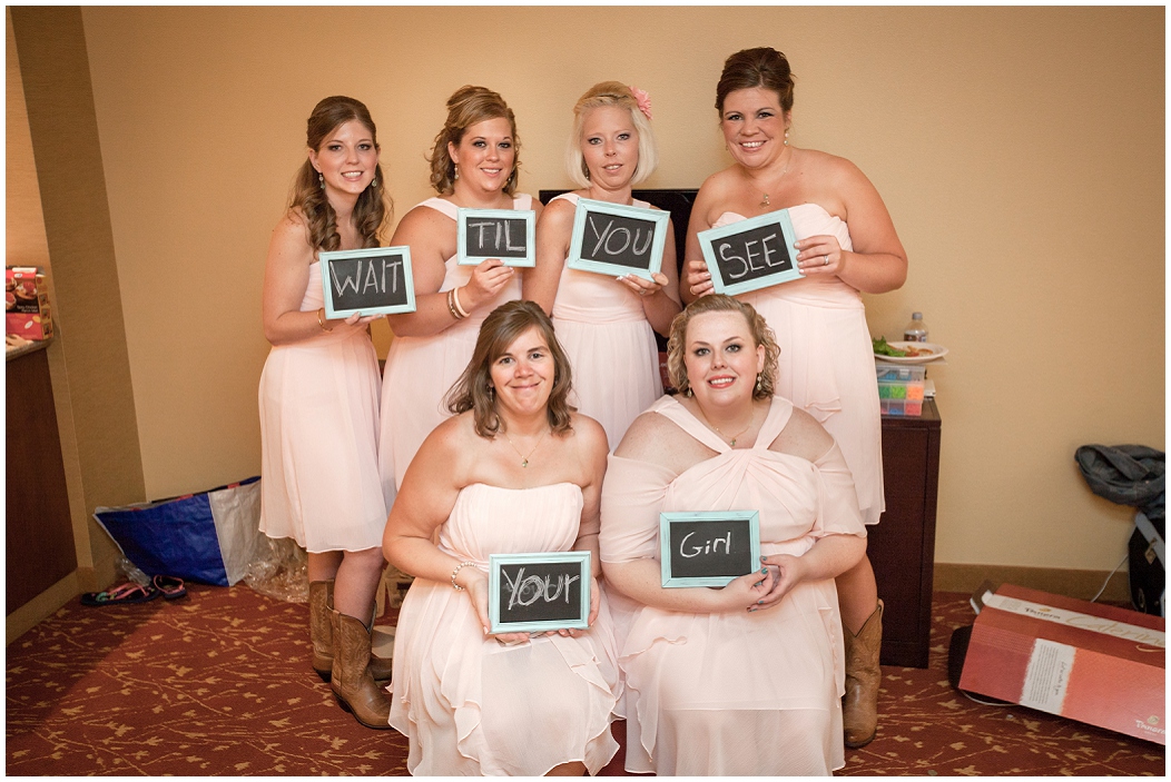 picture of bridesmaids holding chalkboards