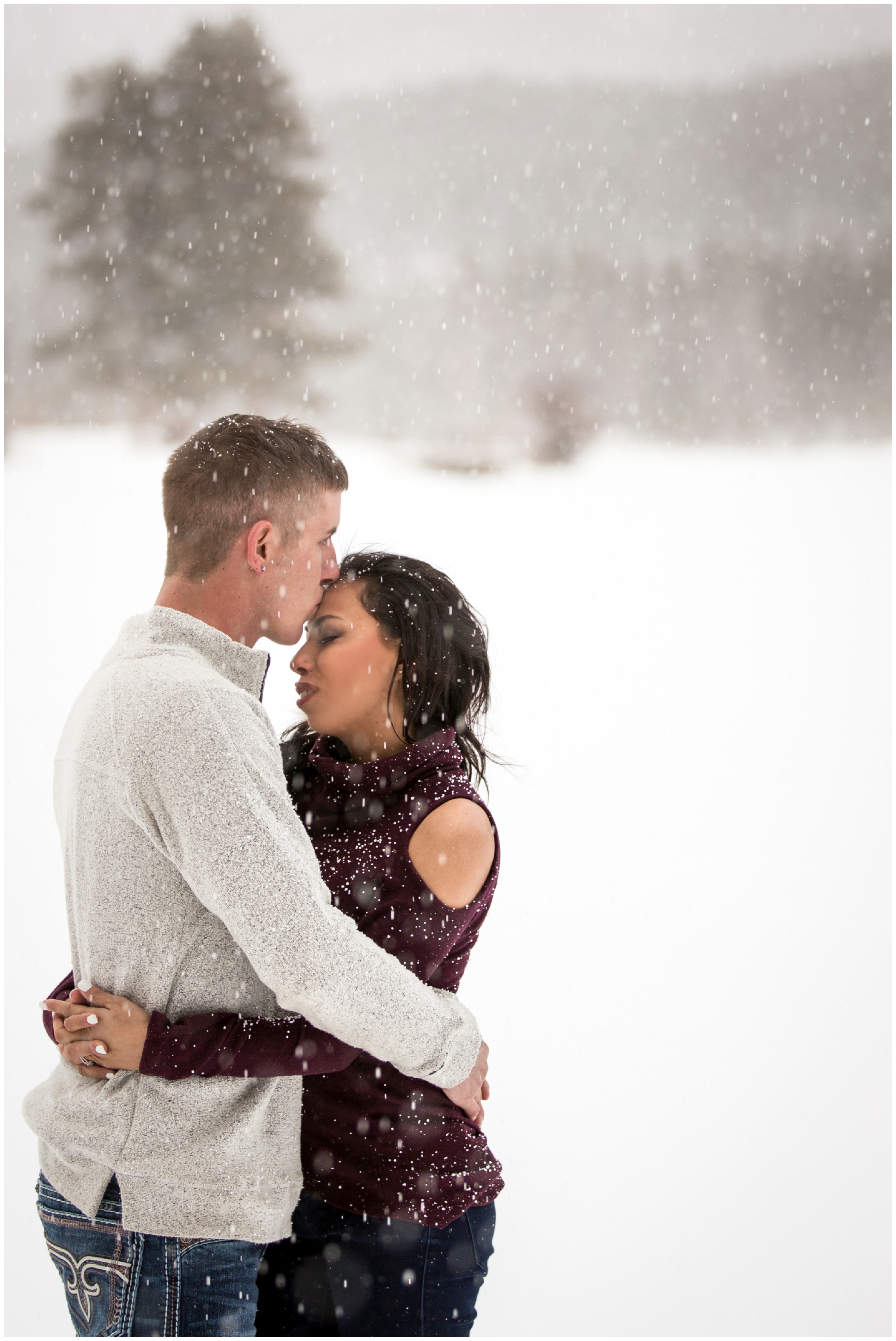 Colorado snowy engagement photos in Rocky Mountain National Park by Plum Pretty Photography 