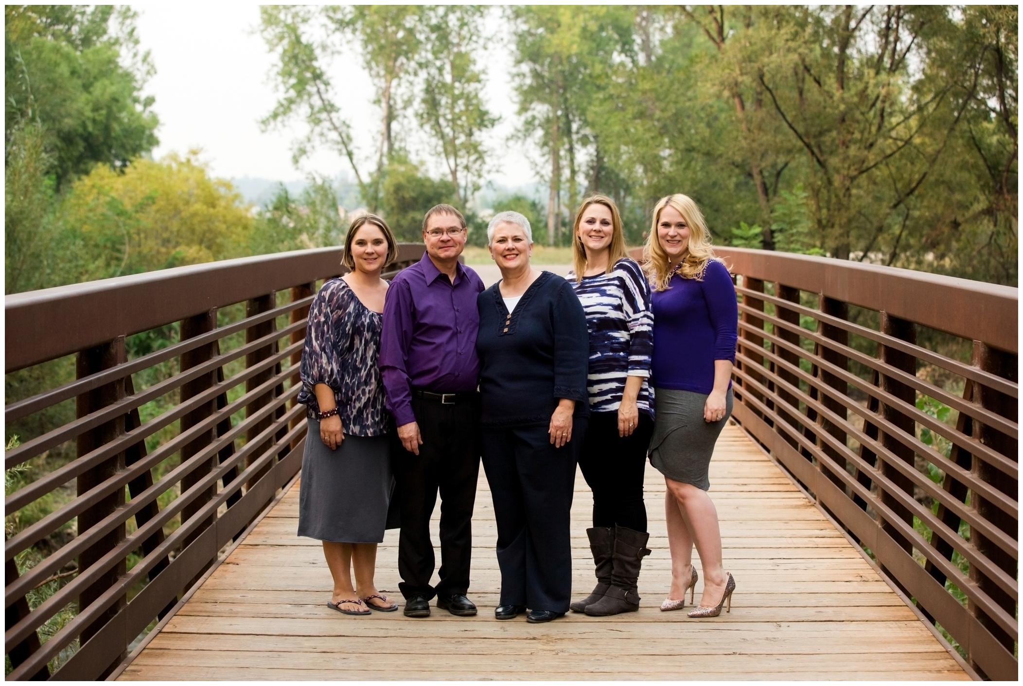 Longmont Colorado family photographs on a bridge